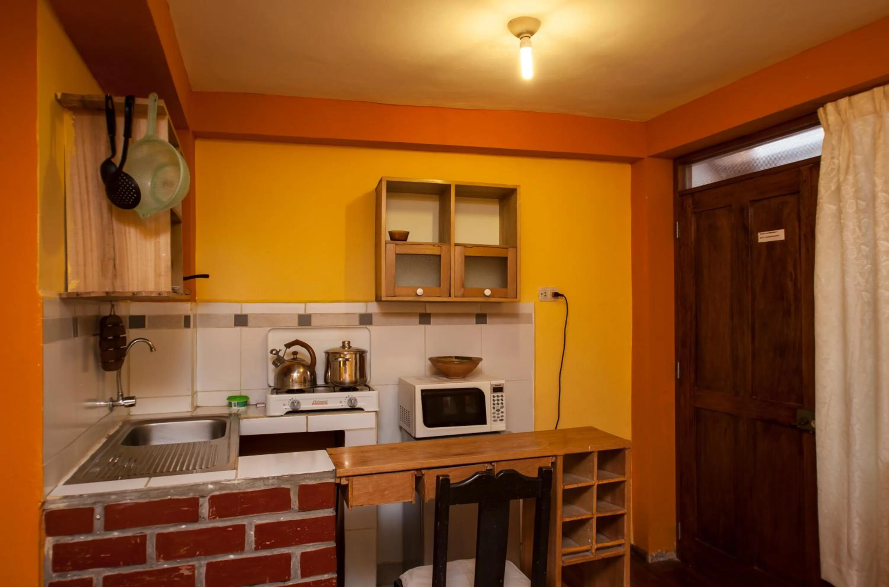Kitchen or kitchenette in Casa De Mama Cusco - The Treehouse