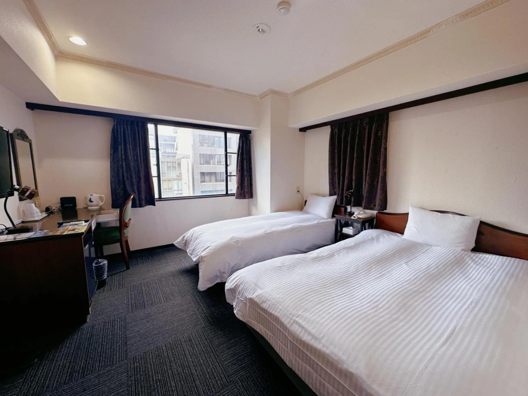 Photo of the whole room, Bed in Nissei Hotel Fukuoka