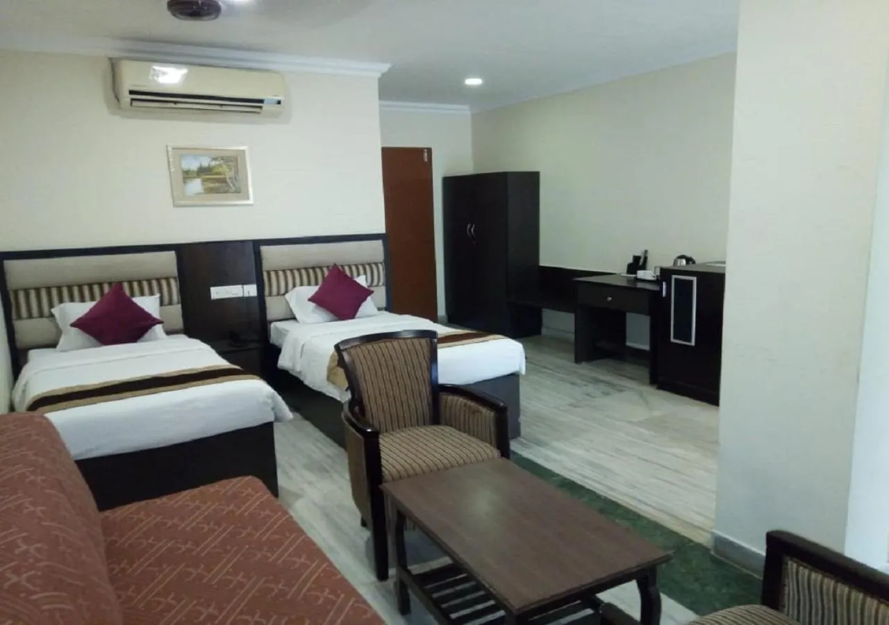 Bedroom in Mermaid Resorts & Banquets