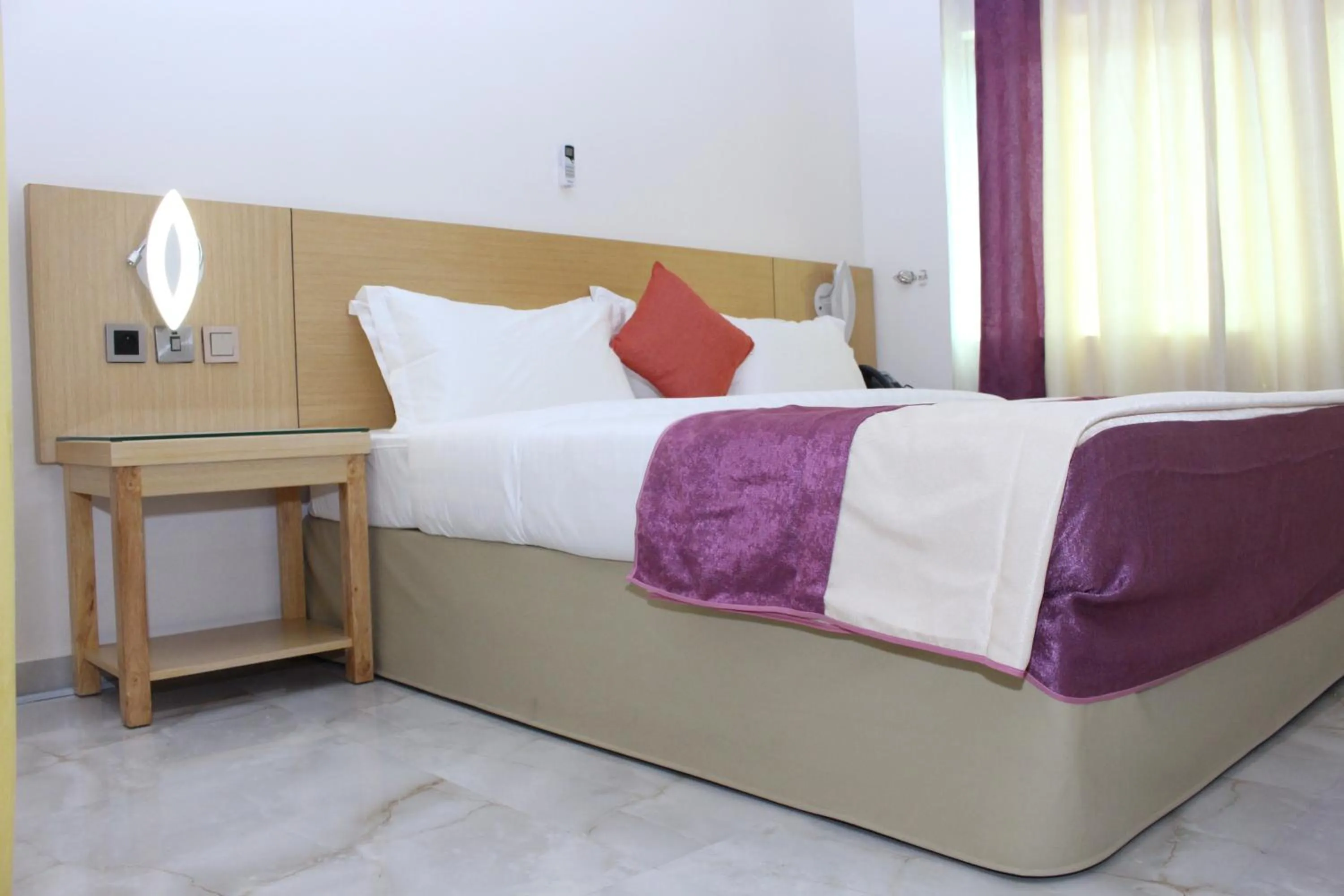 Bedroom in Paradisia Hotel