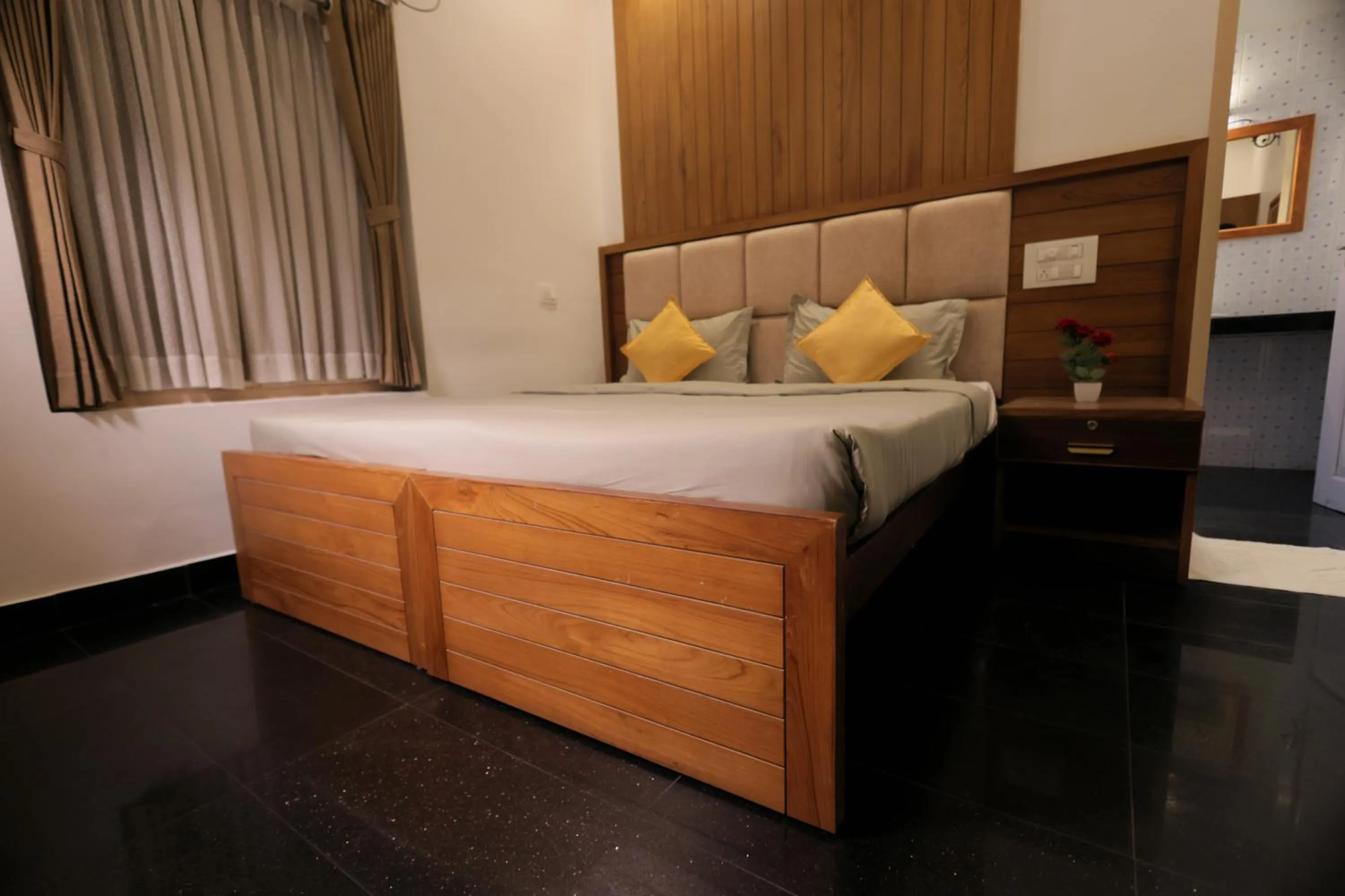 Bed in Ideal Ayurvedic Resort Kovalam