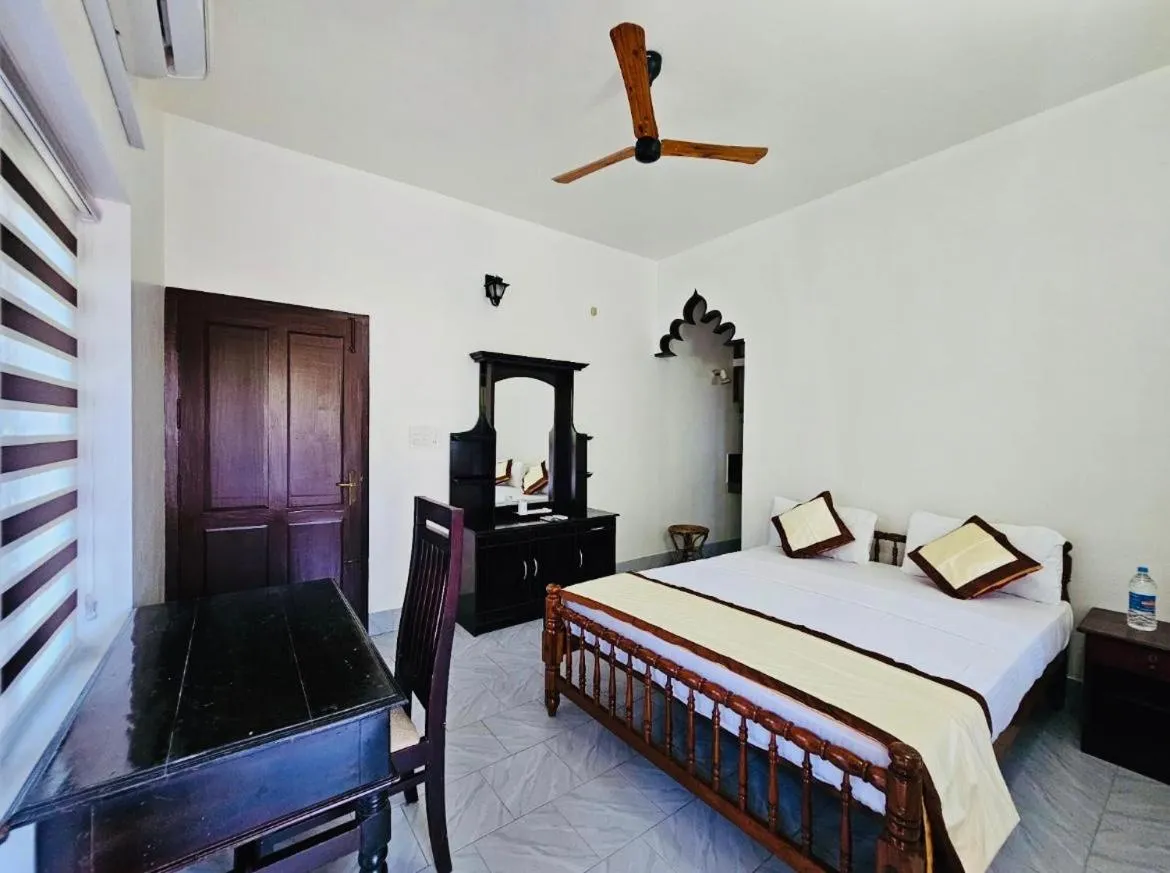 Bed in Ideal Ayurvedic Resort Kovalam