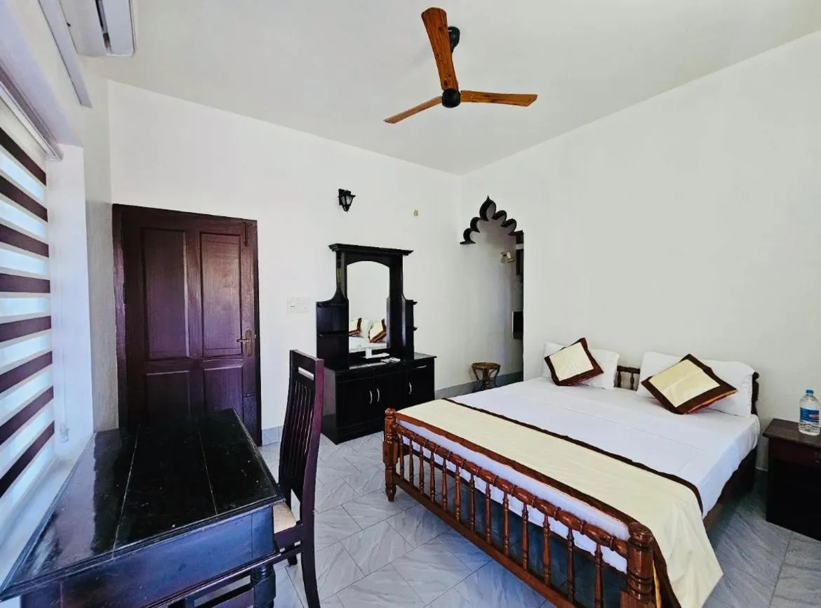 Bed in Ideal Ayurvedic Resort Kovalam