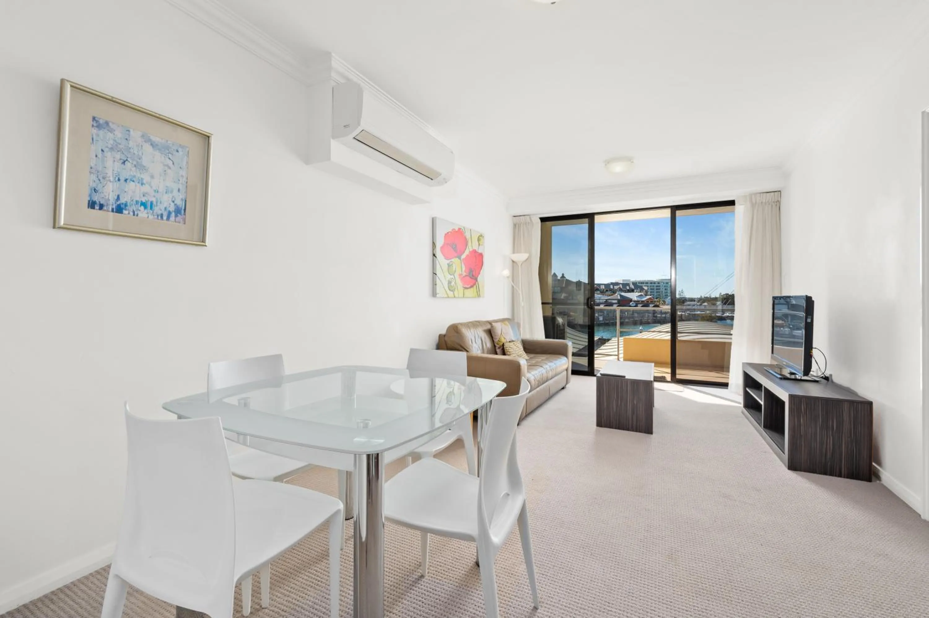 Communal lounge/ TV room in Dolphin Quay Apartments