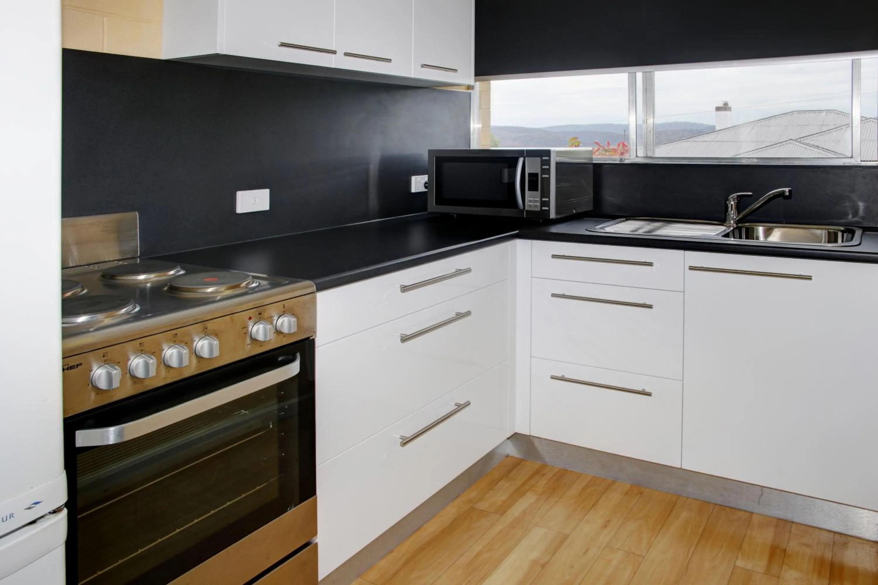 Kitchen or kitchenette in Graham Apartments