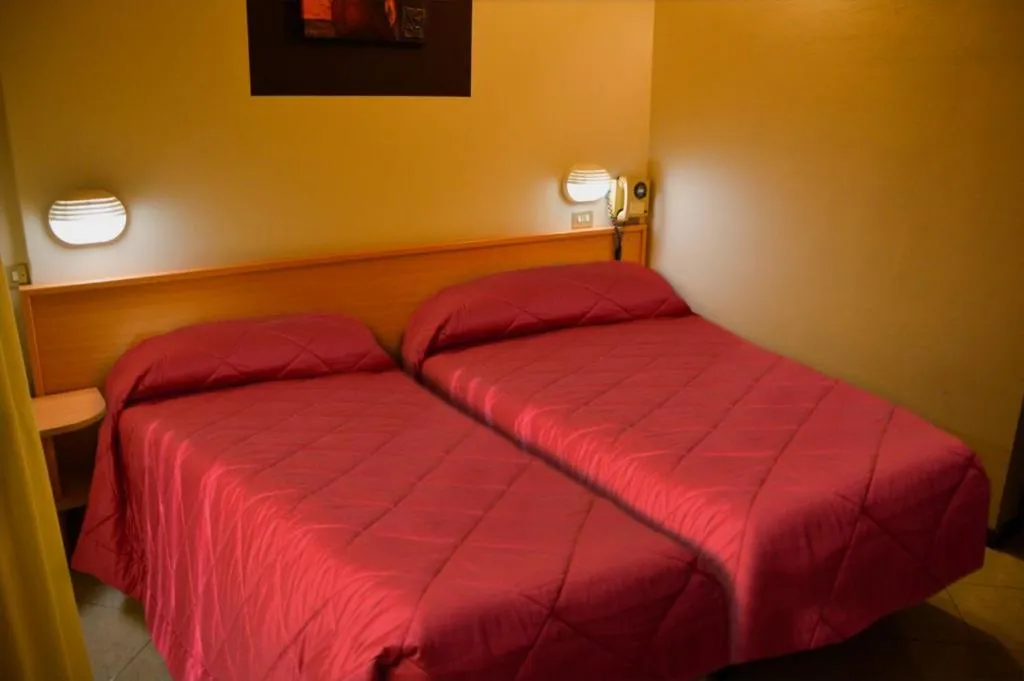 Bed in Albergo Aurora