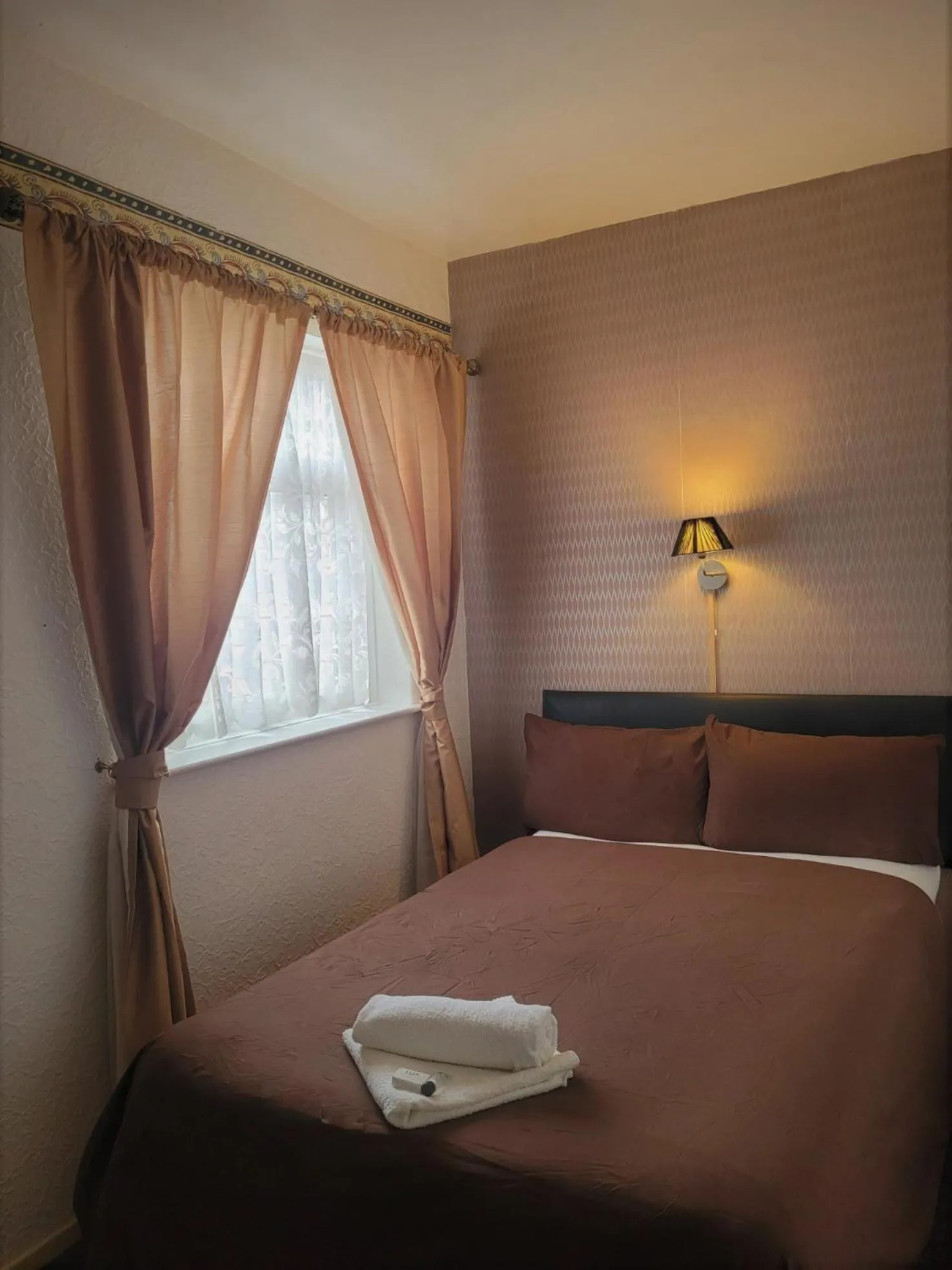 Bed in The Woodland Hotel