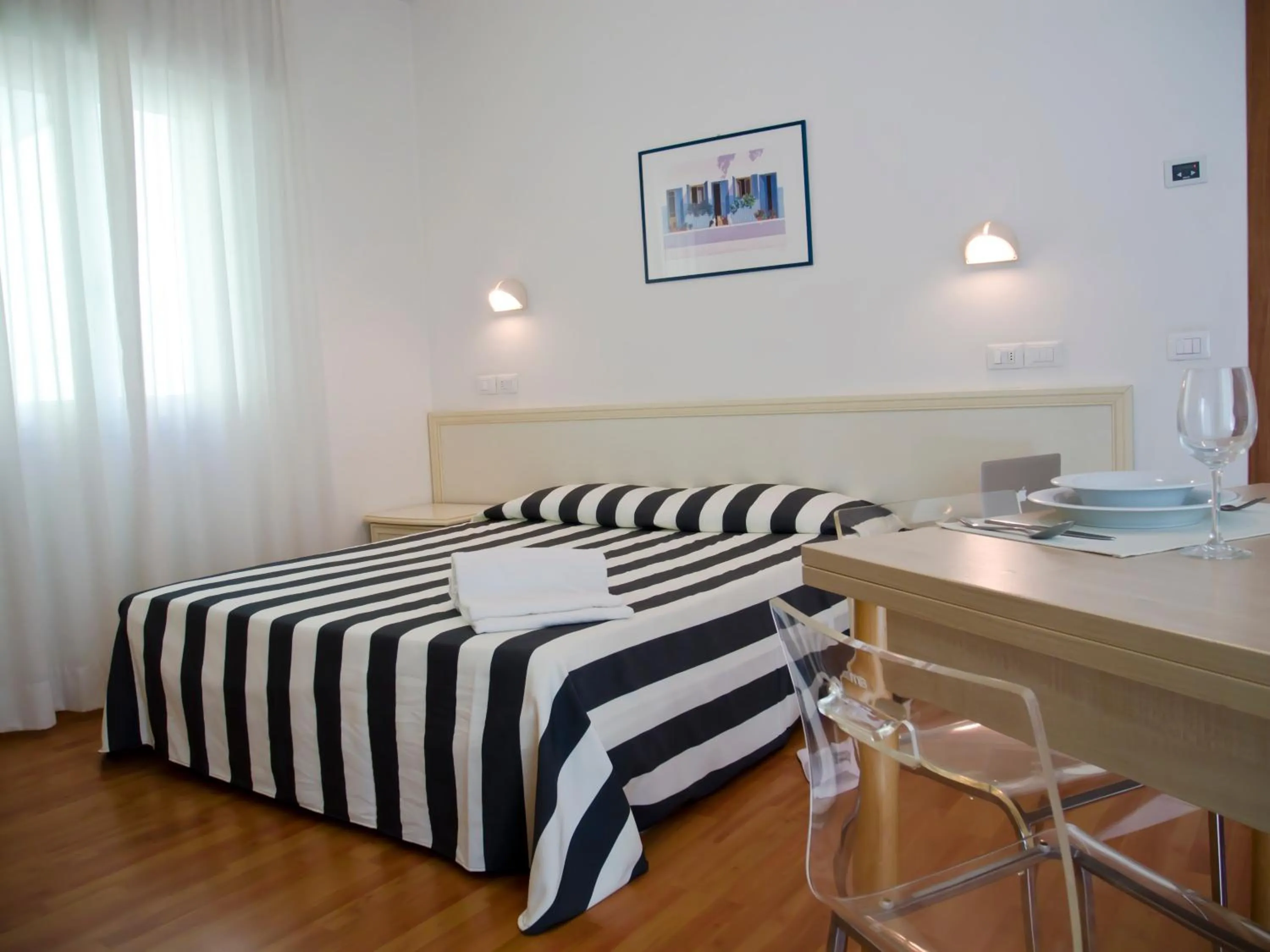 Photo of the whole room, Bed in Residence Divina