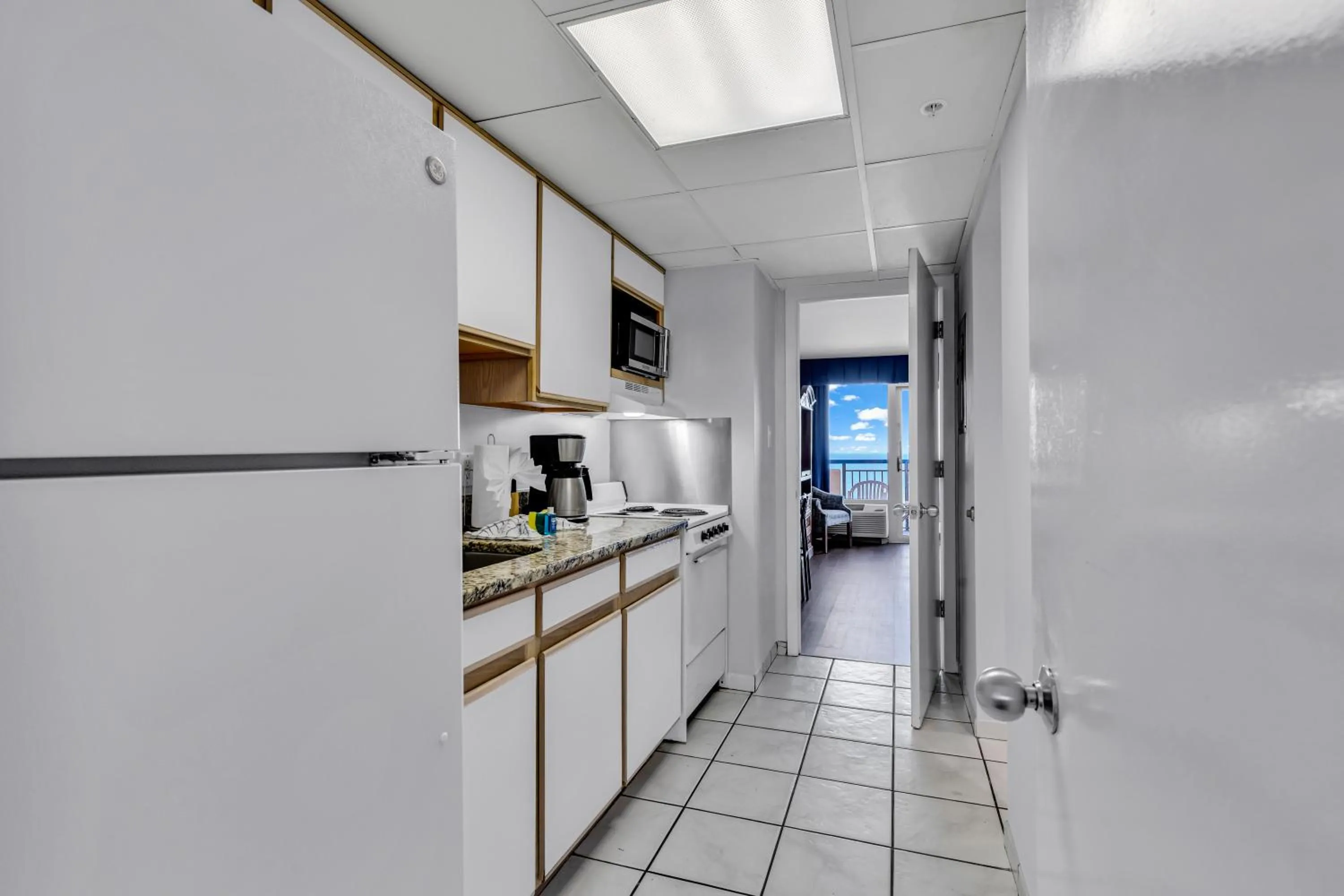 Kitchen or kitchenette in Boardwalk Beach Resort Condo w Oceanfront Balcony