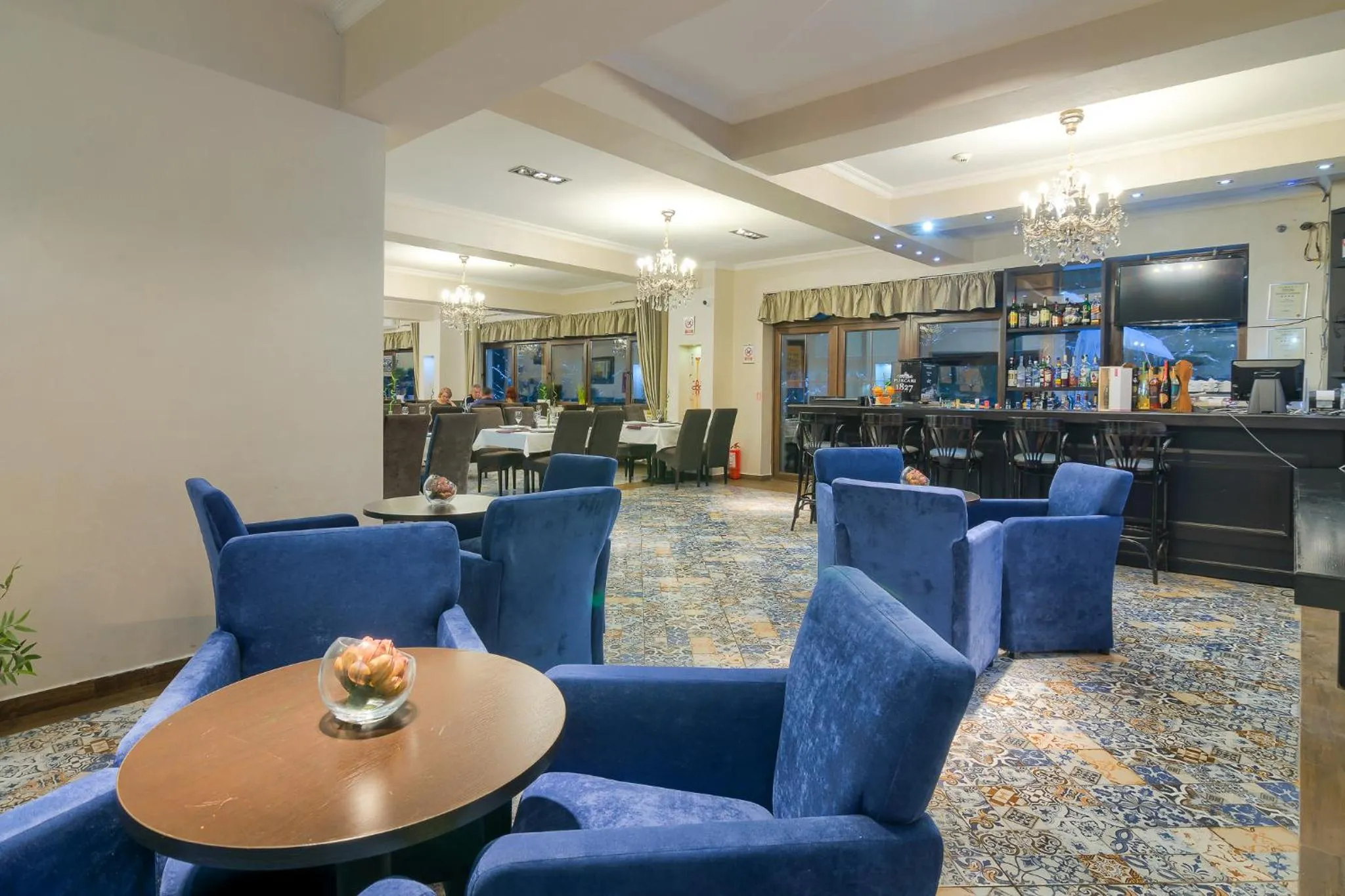 Communal lounge/ TV room in Rizzo Boutique Hotel