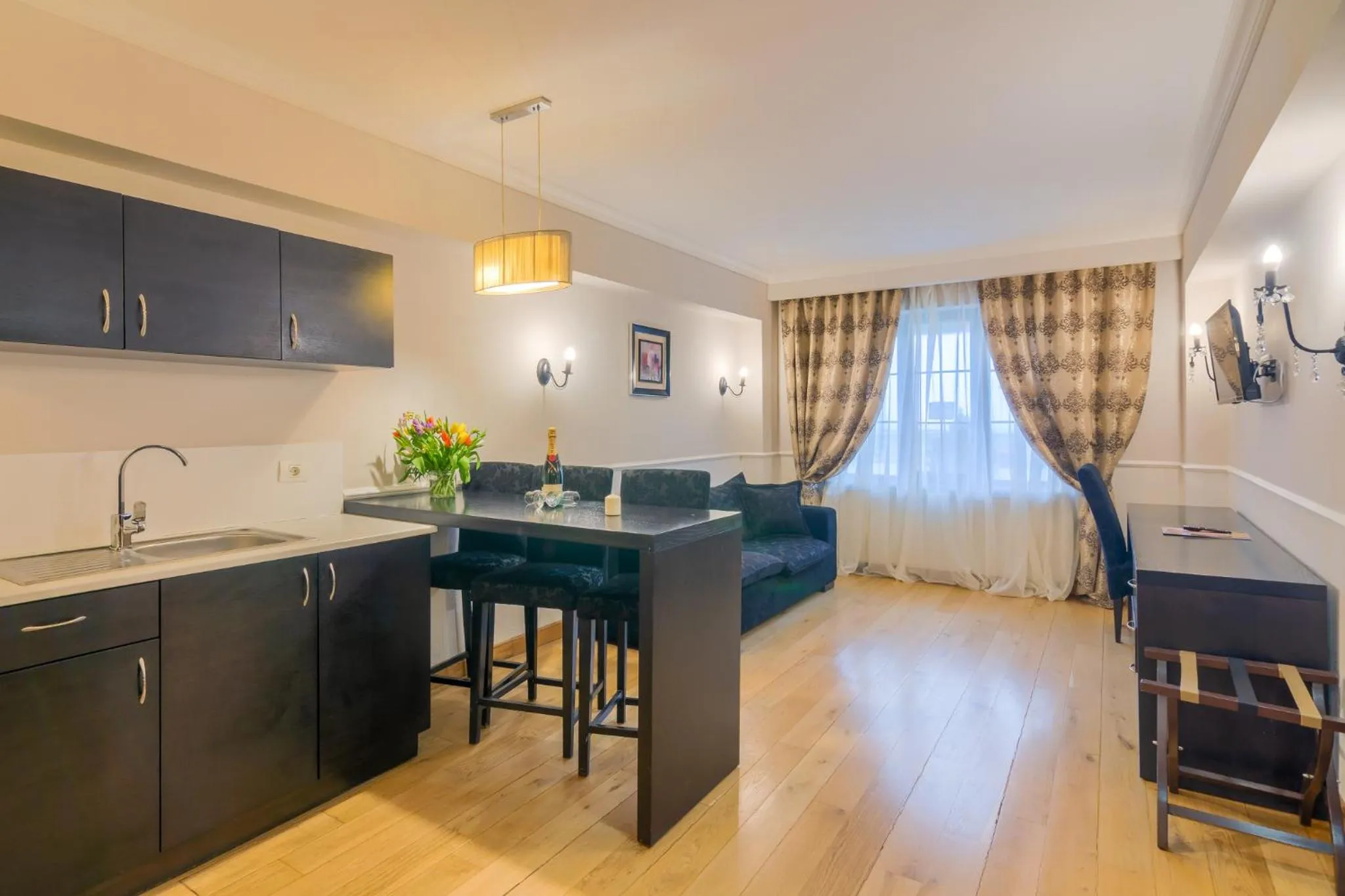 Kitchen or kitchenette in Rizzo Boutique Hotel