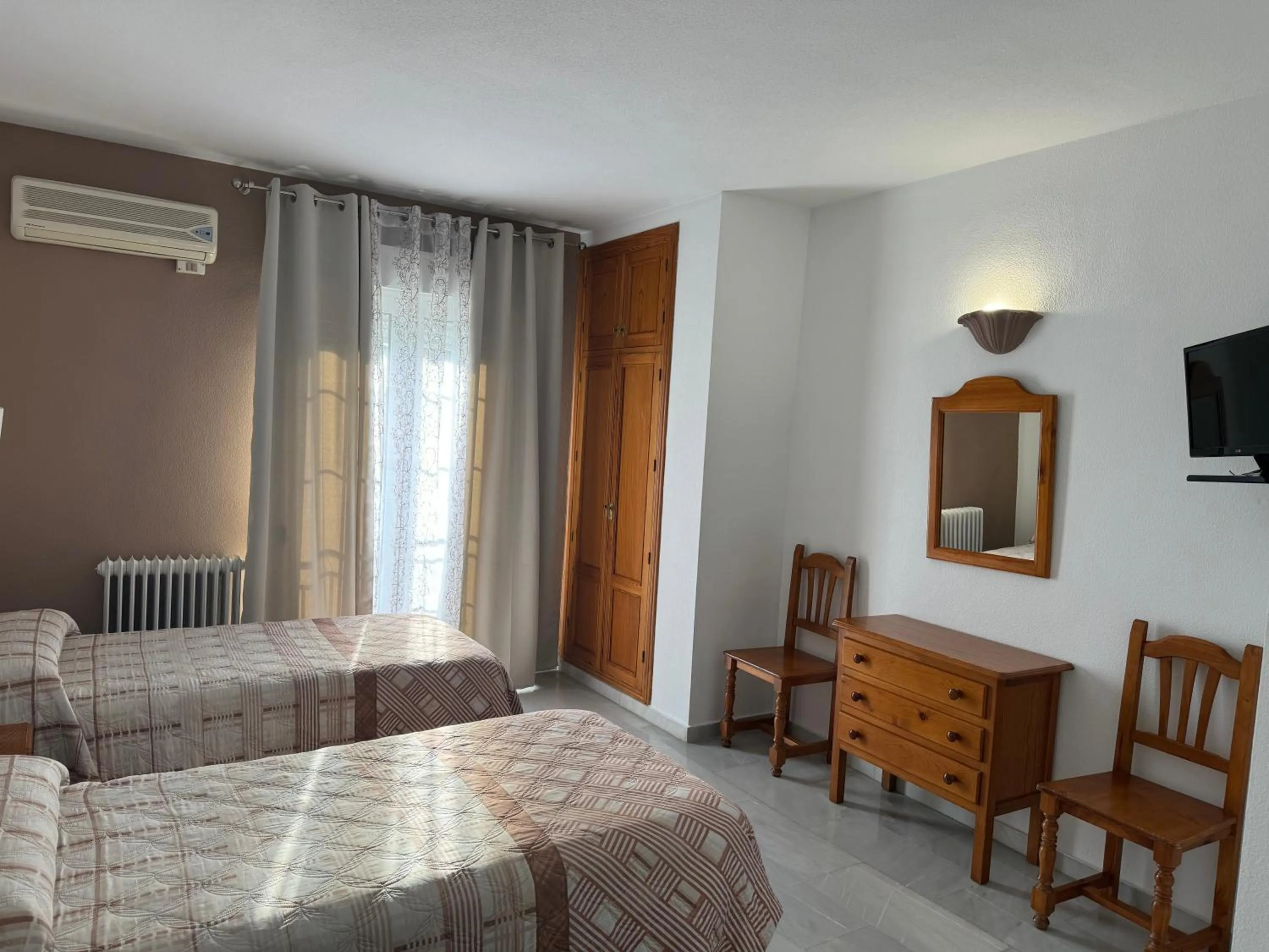 Bed in Hotel Mirasol