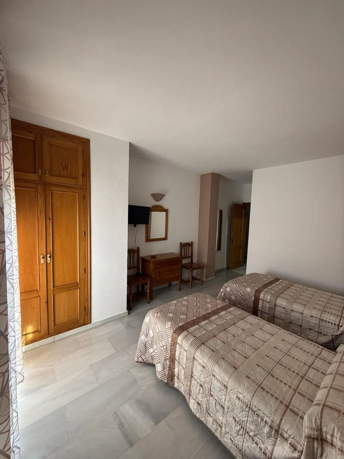 Bed in Hotel Mirasol