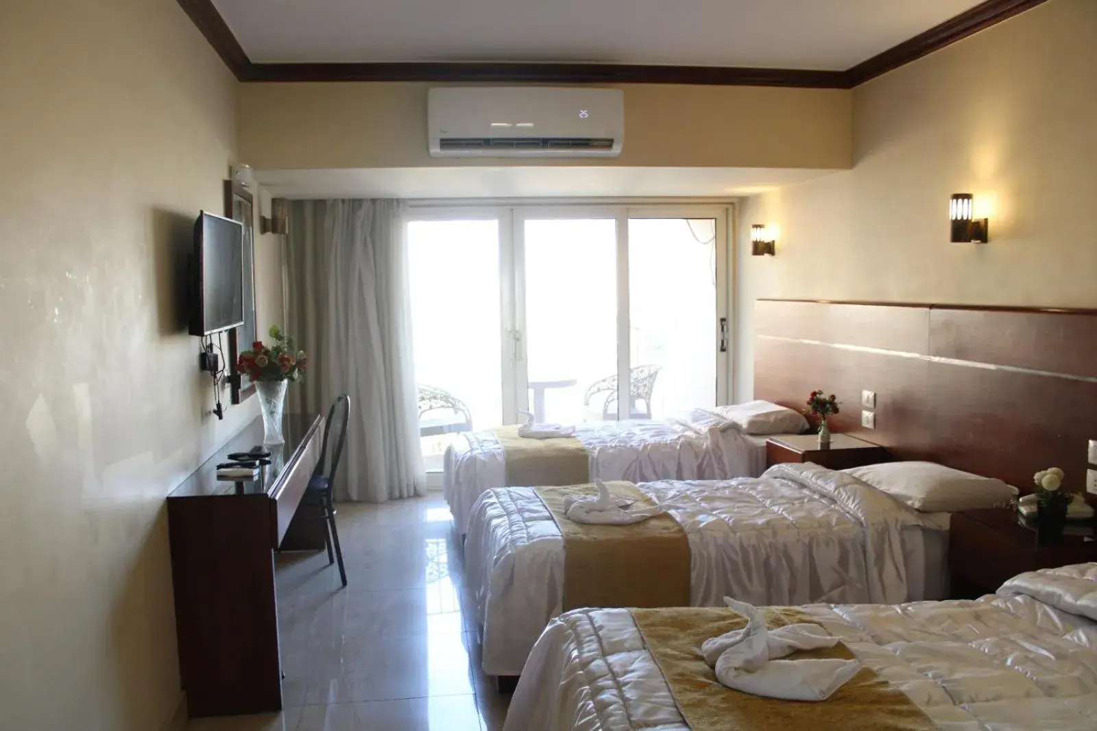 Deluxe Triple Room with Nile View in Pharaohs Hotel Deluxe Triple Room with Nile View in Pharaohs Hotel