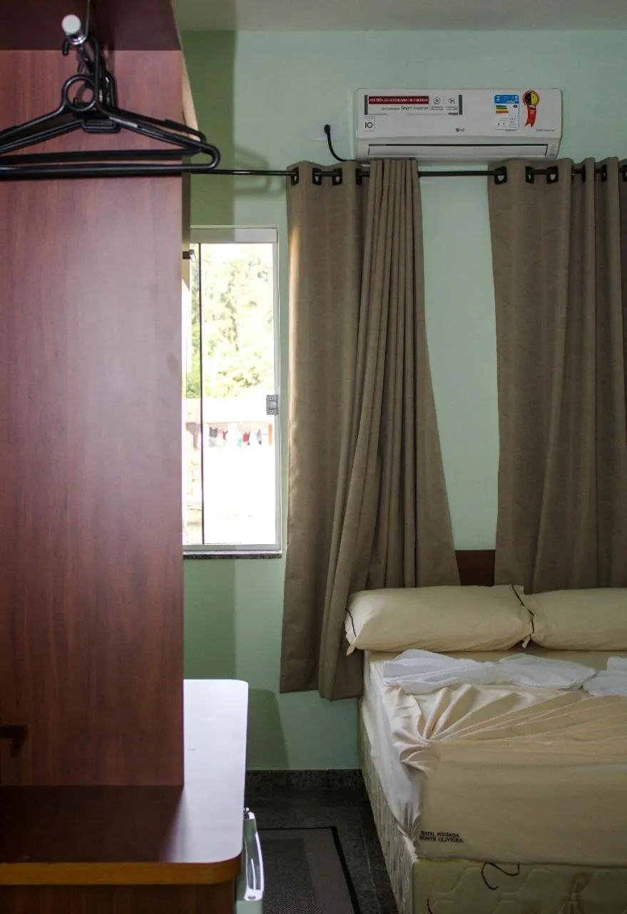 Bed in Pousada Monte Oliveira