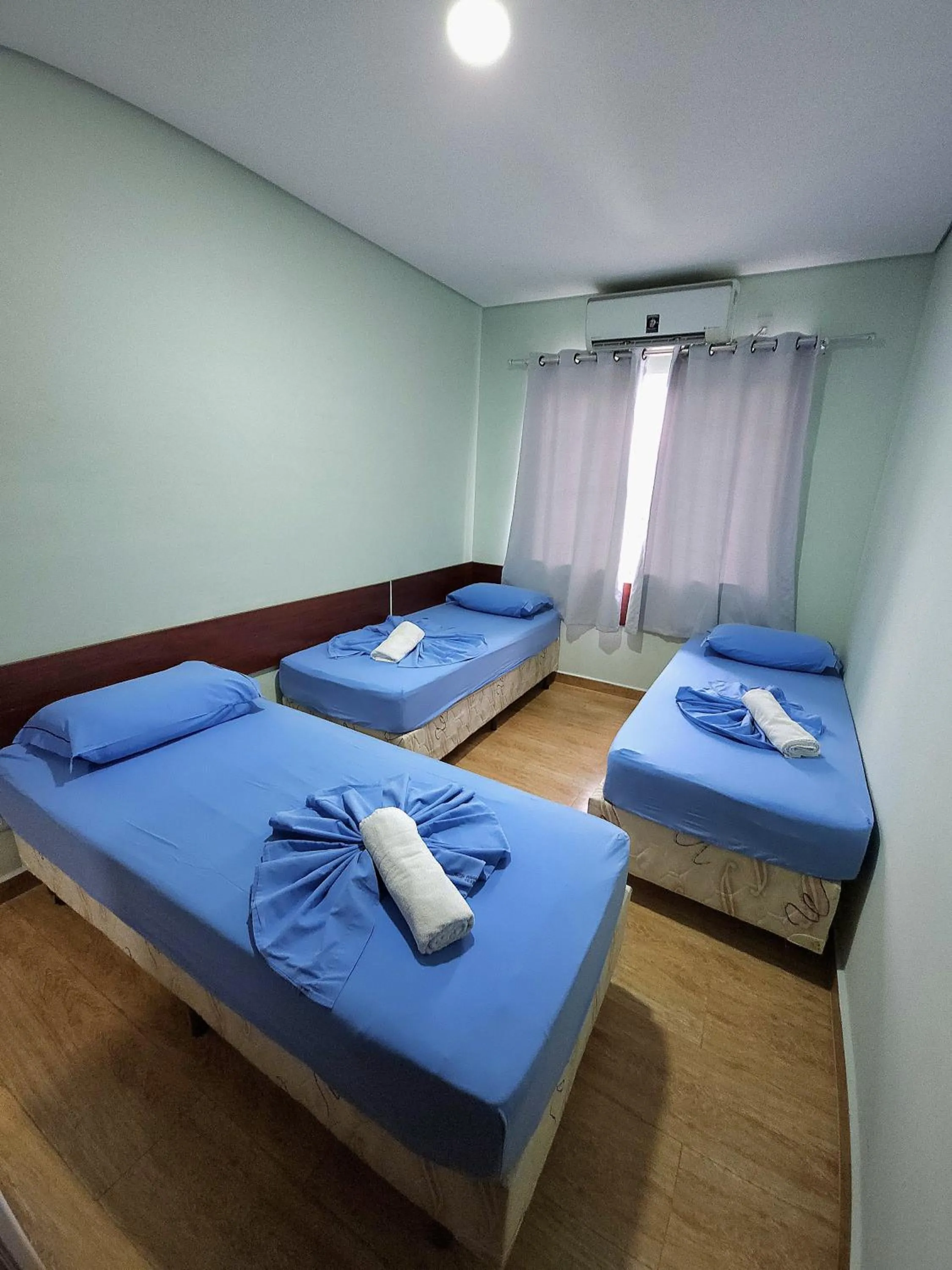 Bed in Pousada Monte Oliveira