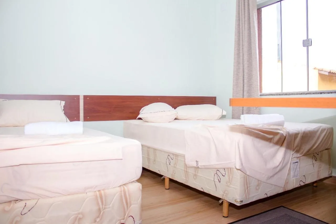 Bed in Pousada Monte Oliveira
