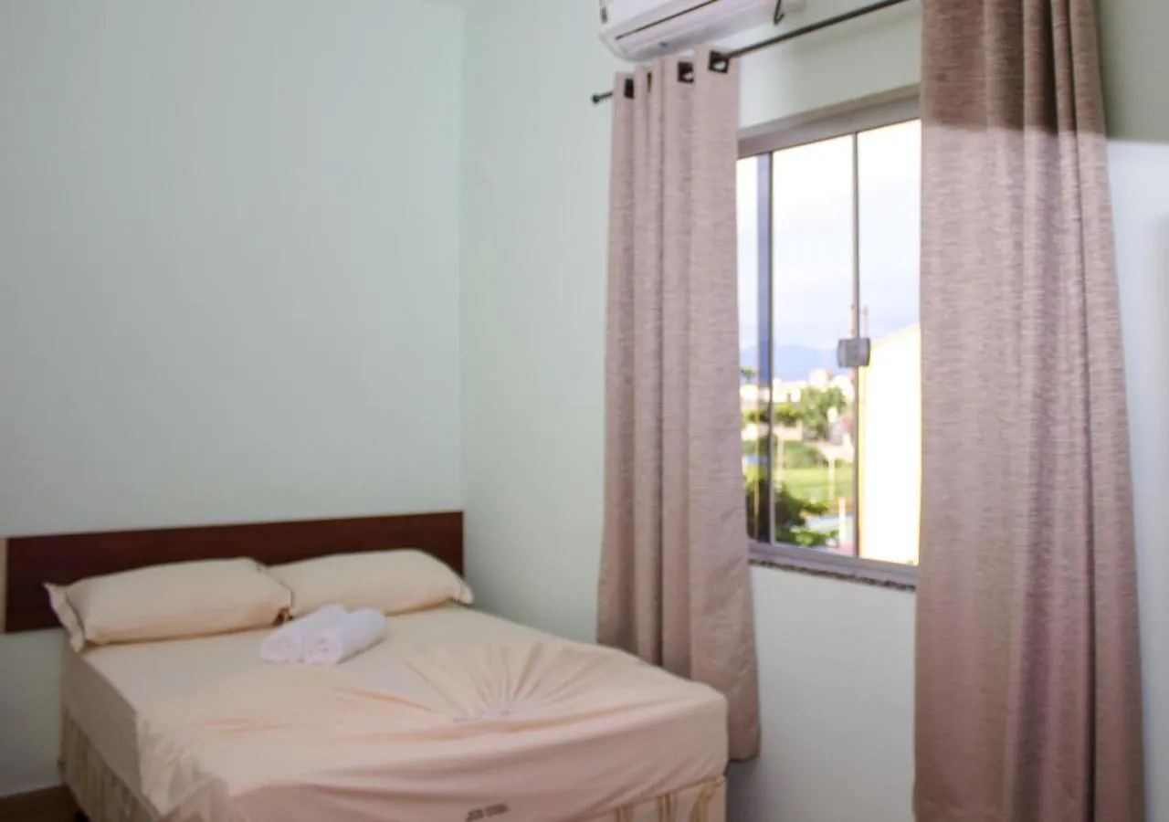 Bed in Pousada Monte Oliveira