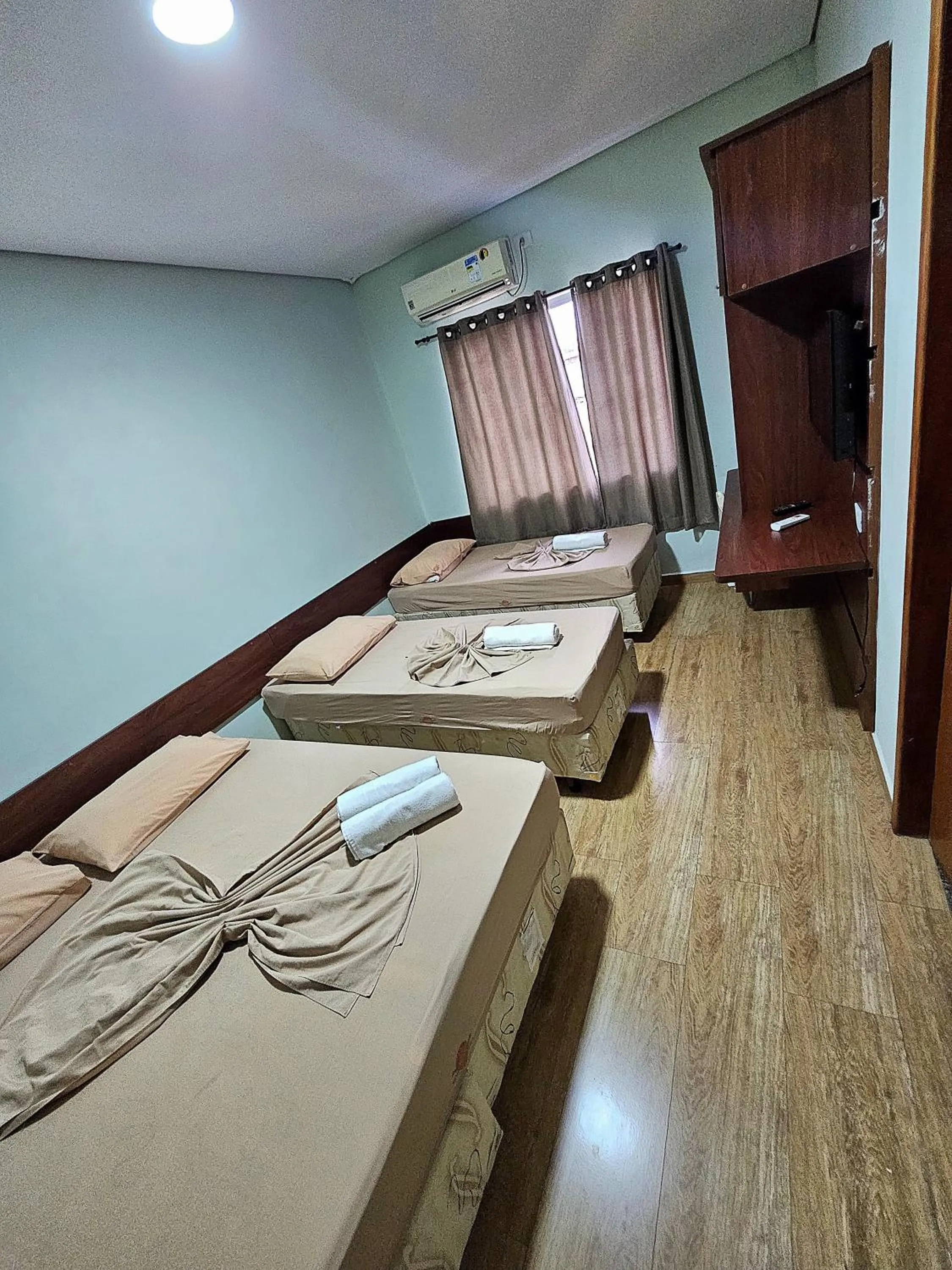 Bed in Pousada Monte Oliveira