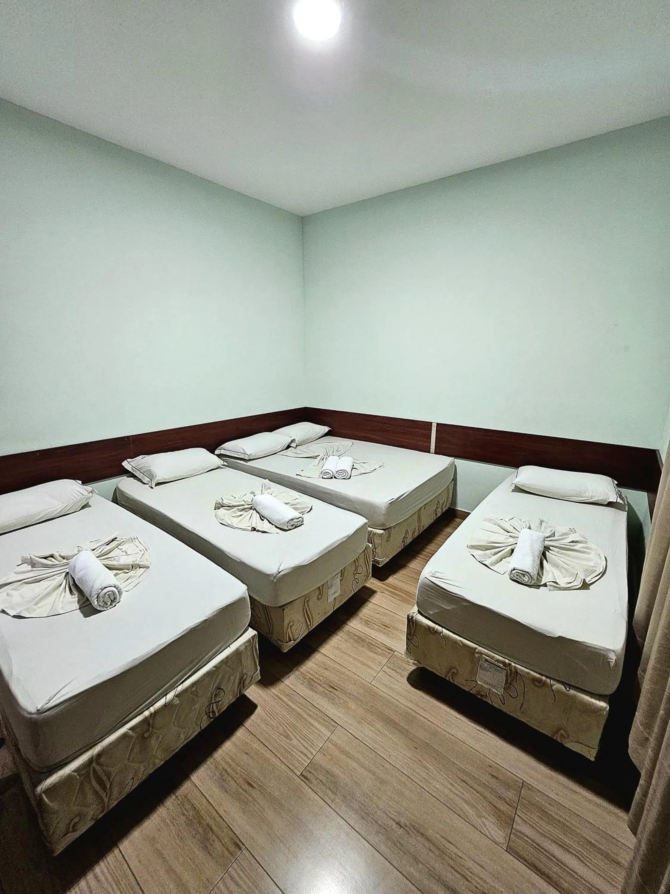 Bed in Pousada Monte Oliveira