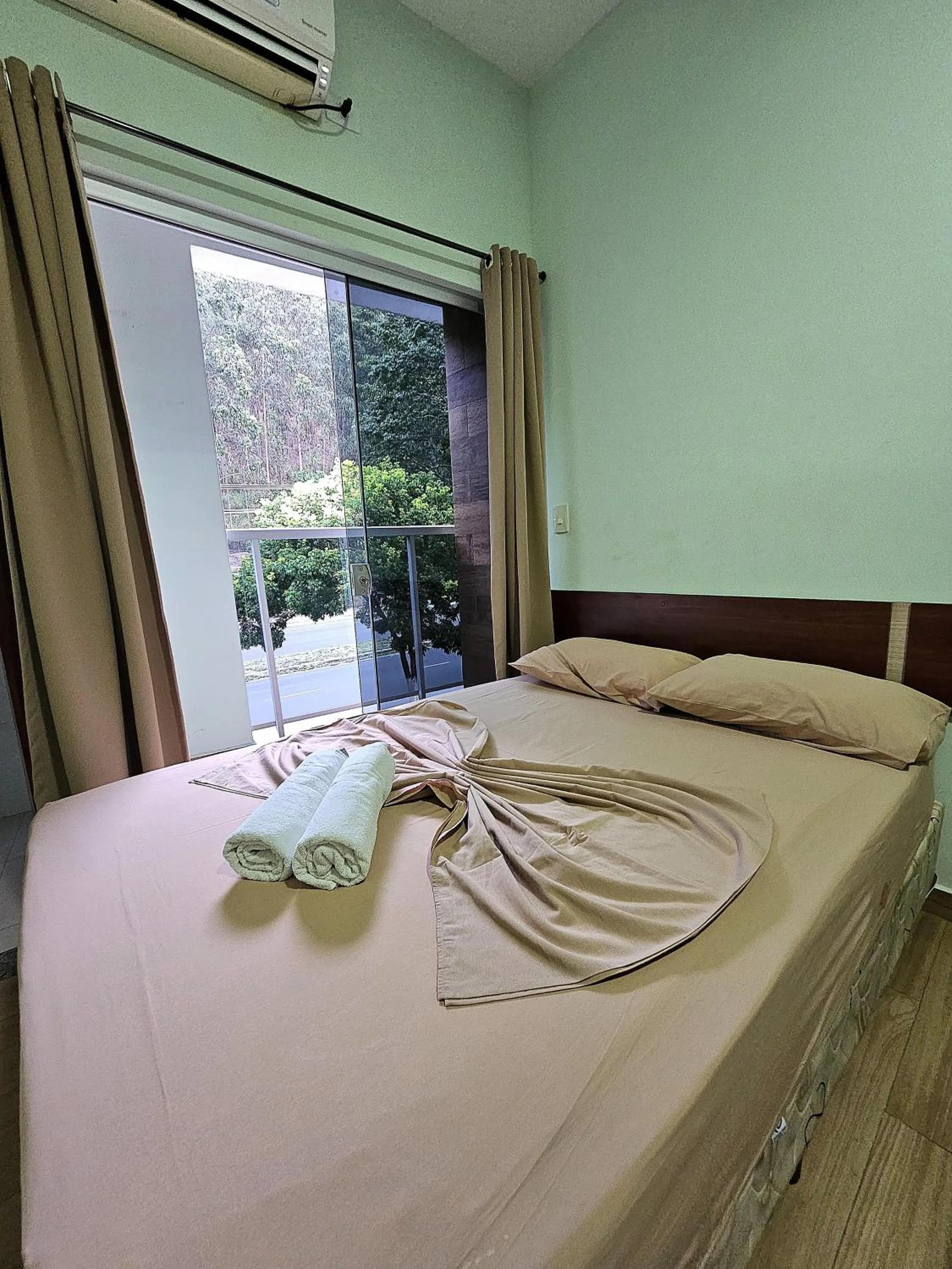Bed in Pousada Monte Oliveira