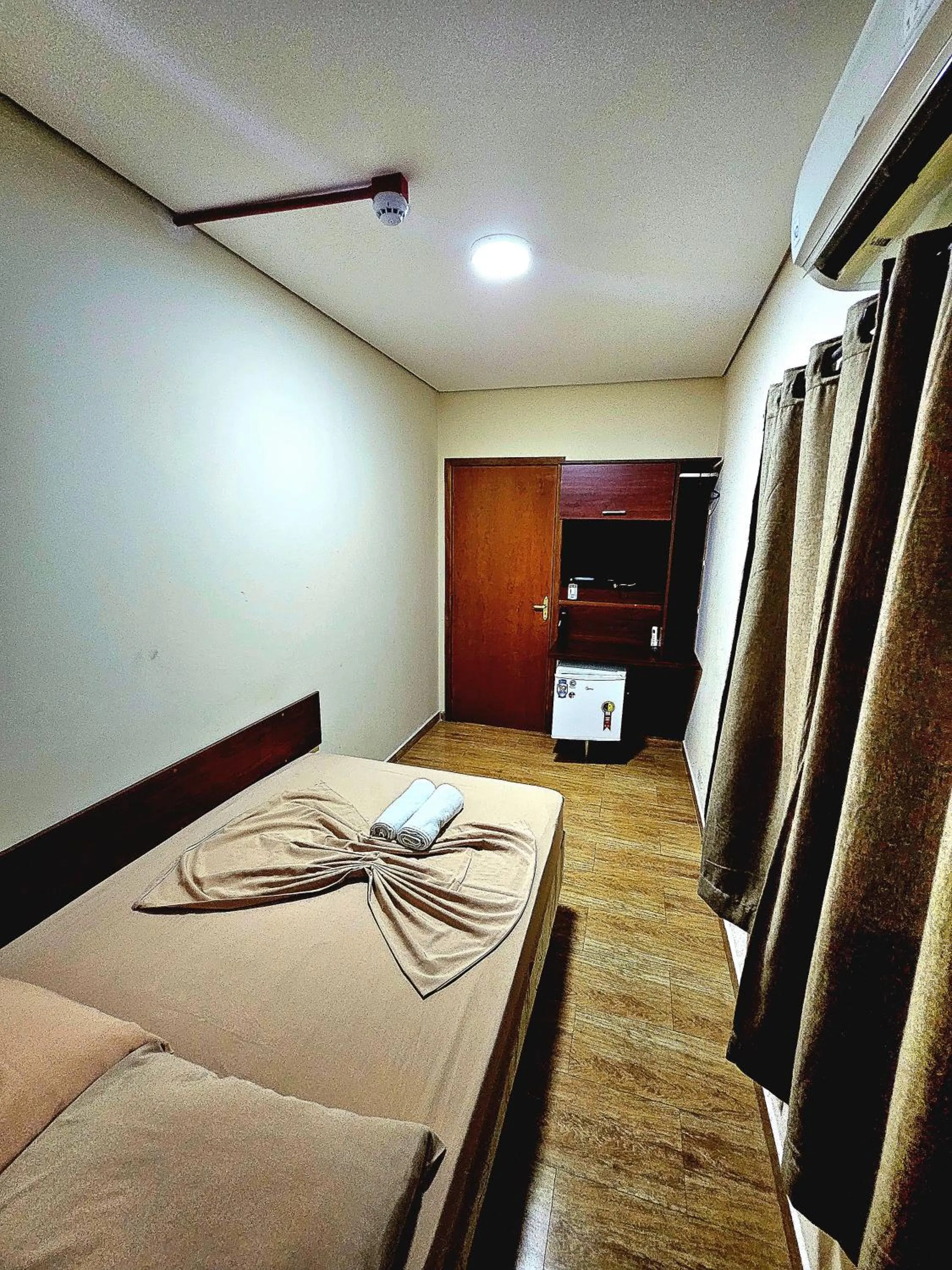 Bed in Pousada Monte Oliveira