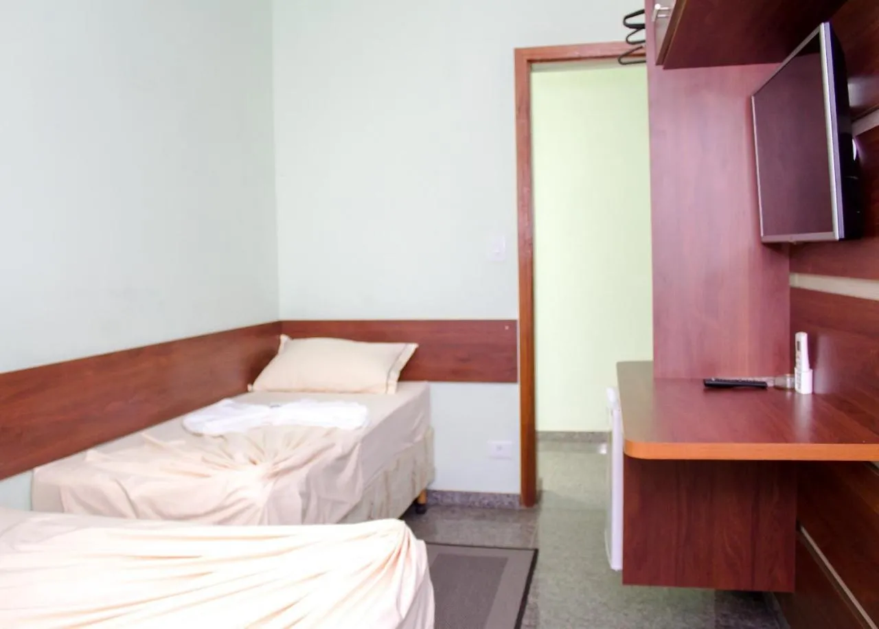 Bed in Pousada Monte Oliveira