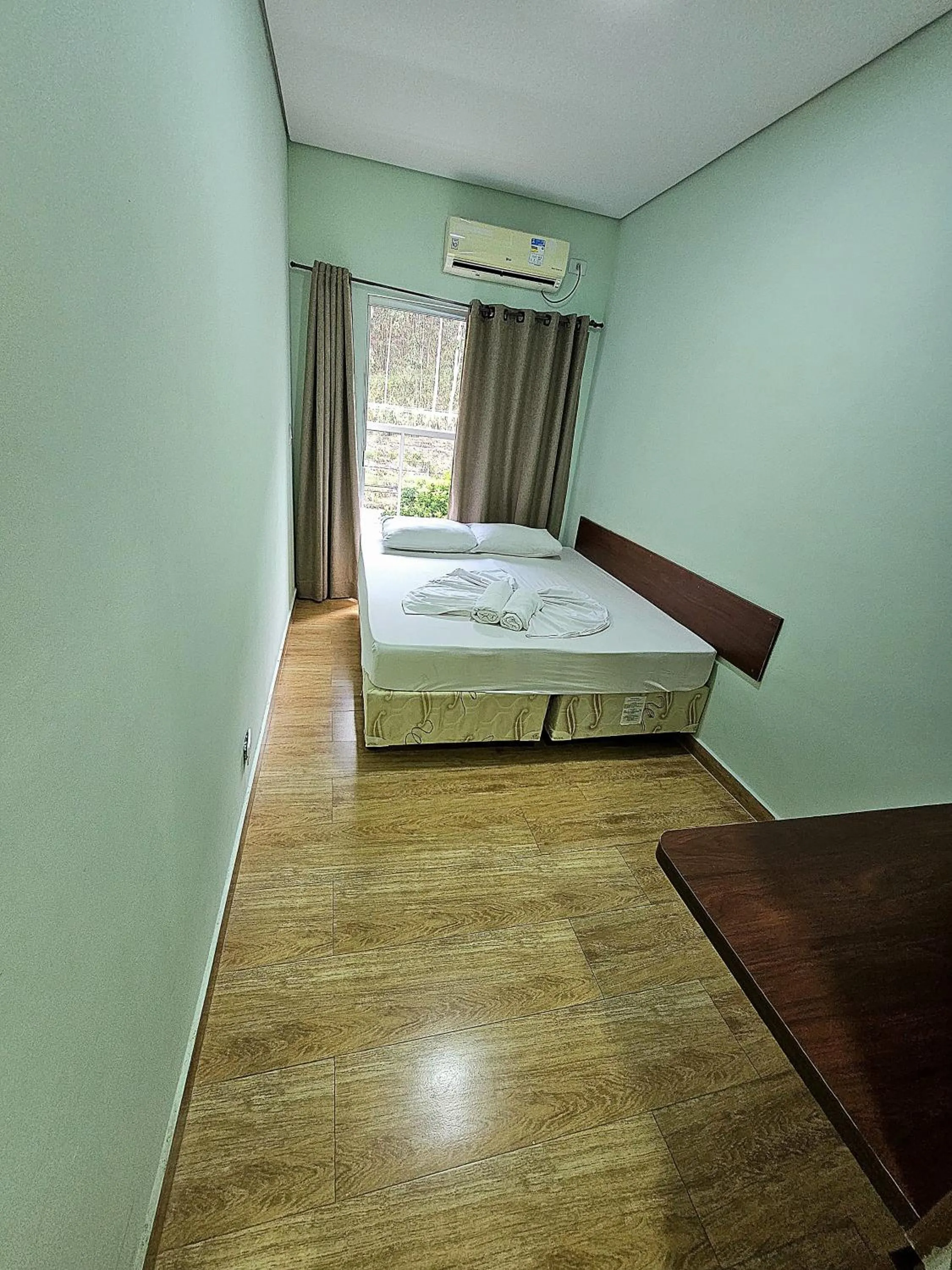 Bed in Pousada Monte Oliveira