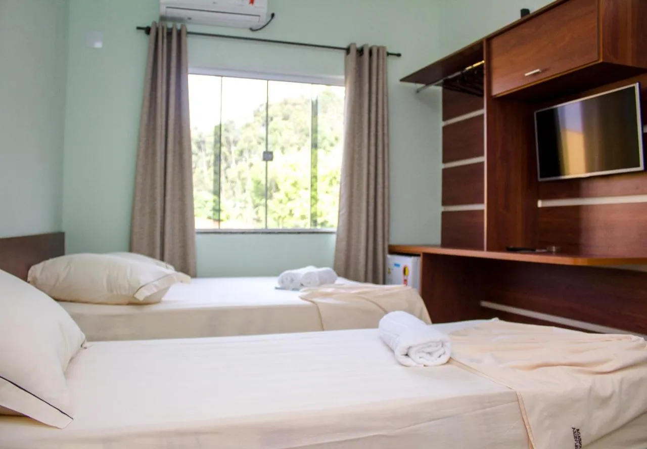 Bed in Pousada Monte Oliveira