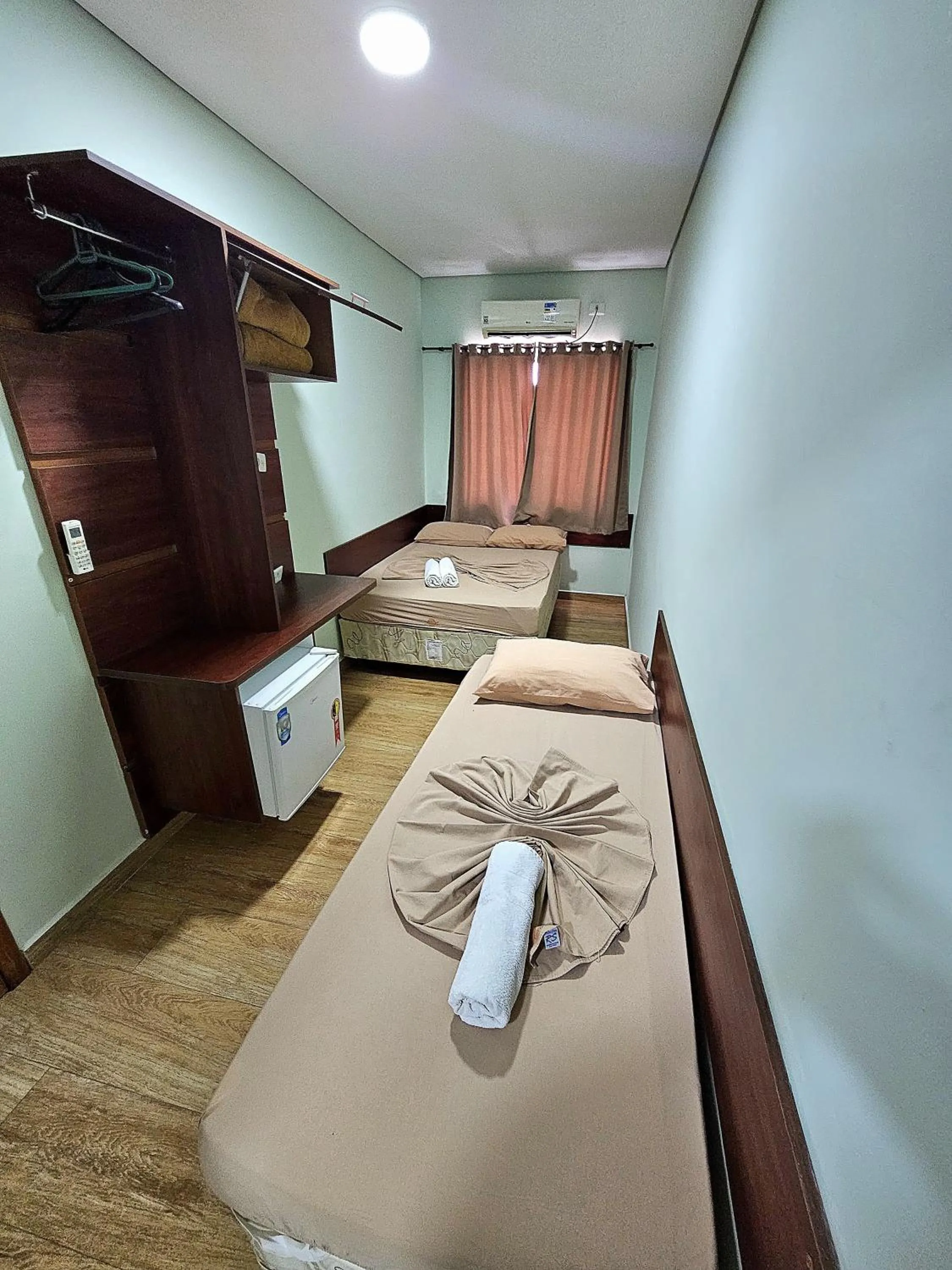 Bed in Pousada Monte Oliveira