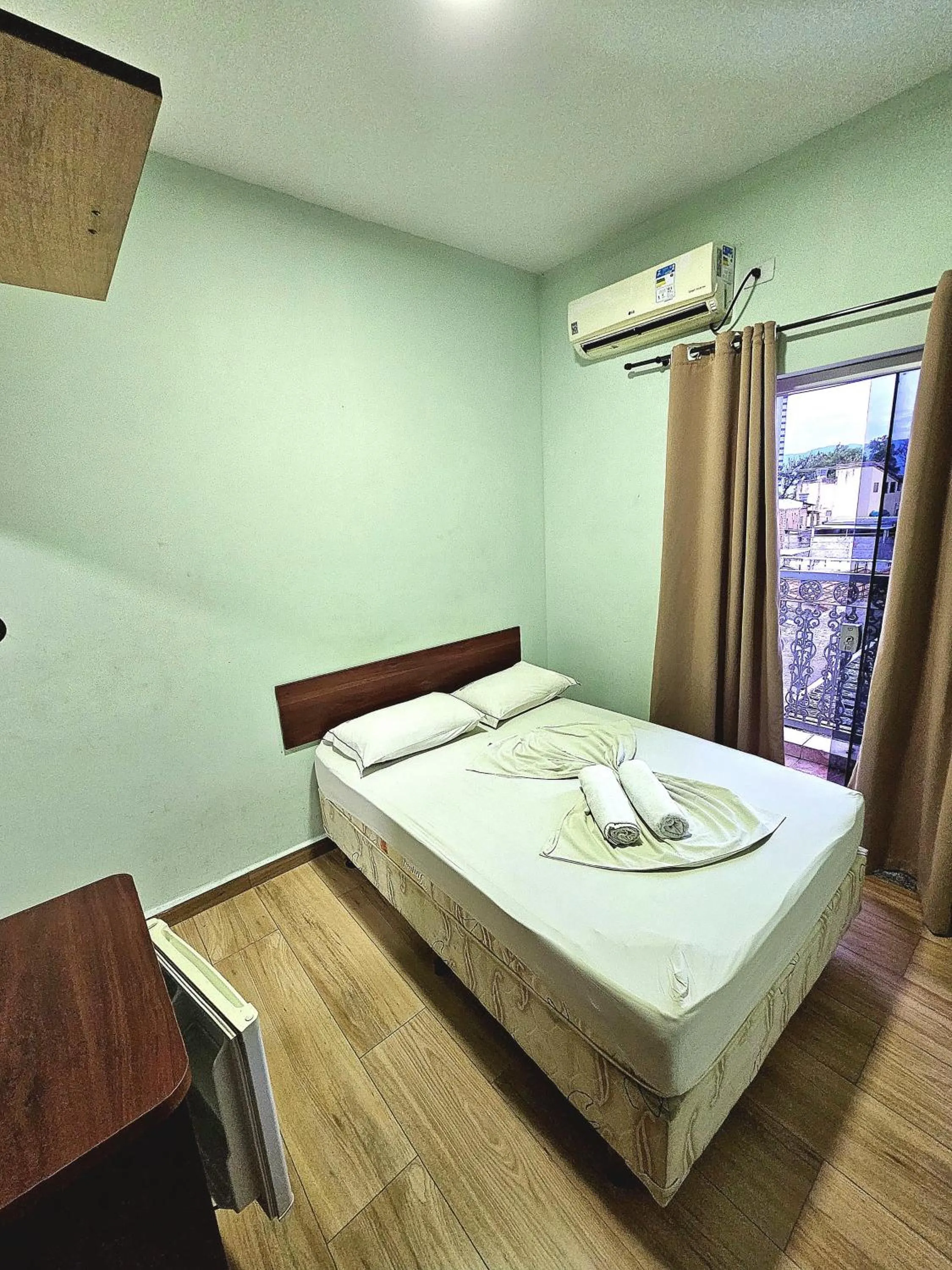 Bed in Pousada Monte Oliveira