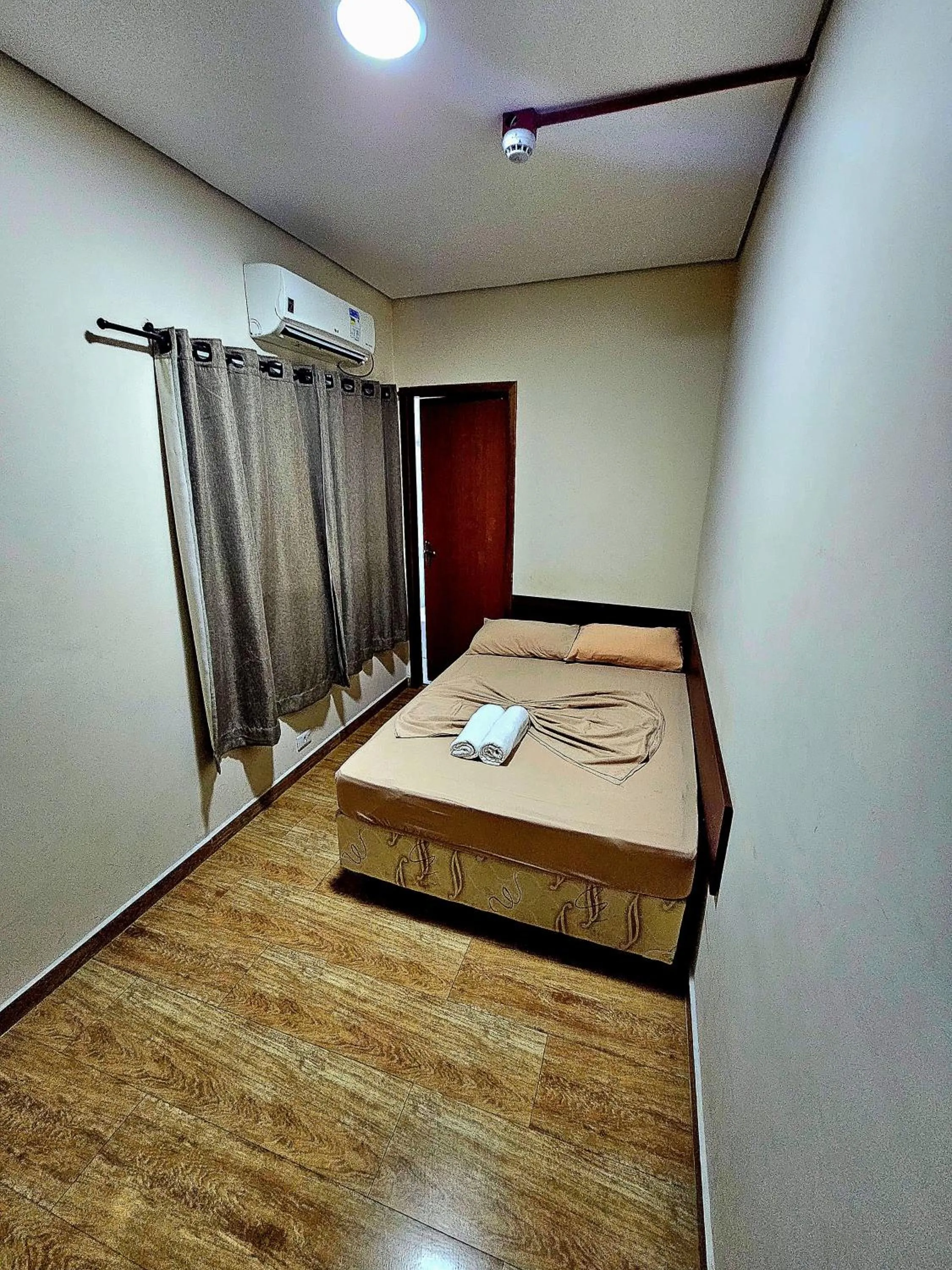 Bed in Pousada Monte Oliveira