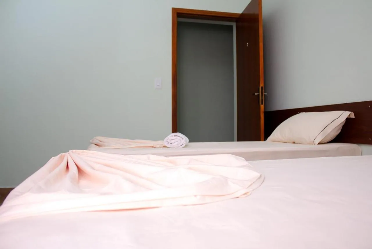 Bed in Pousada Monte Oliveira