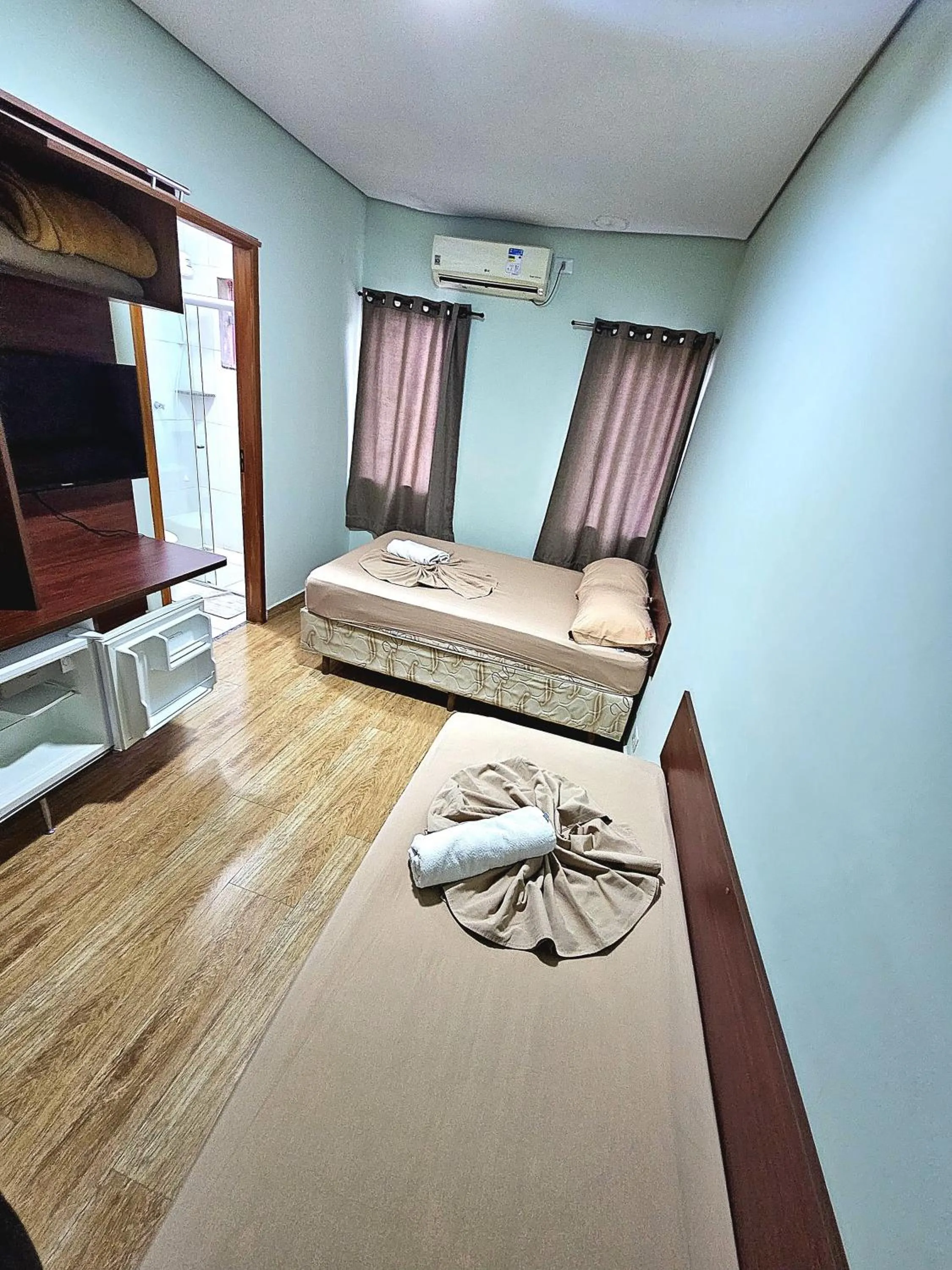 Bed in Pousada Monte Oliveira