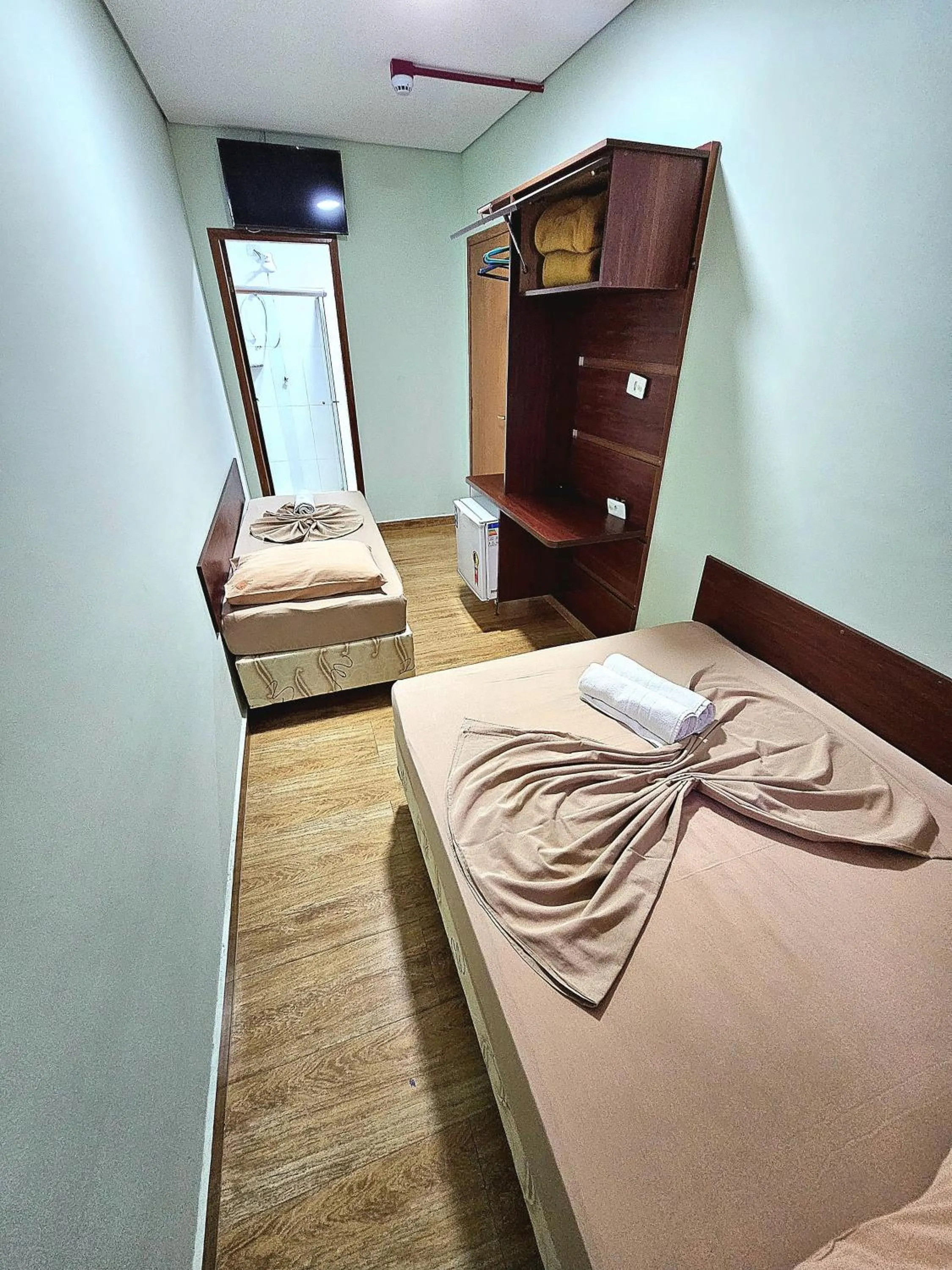 Bed in Pousada Monte Oliveira