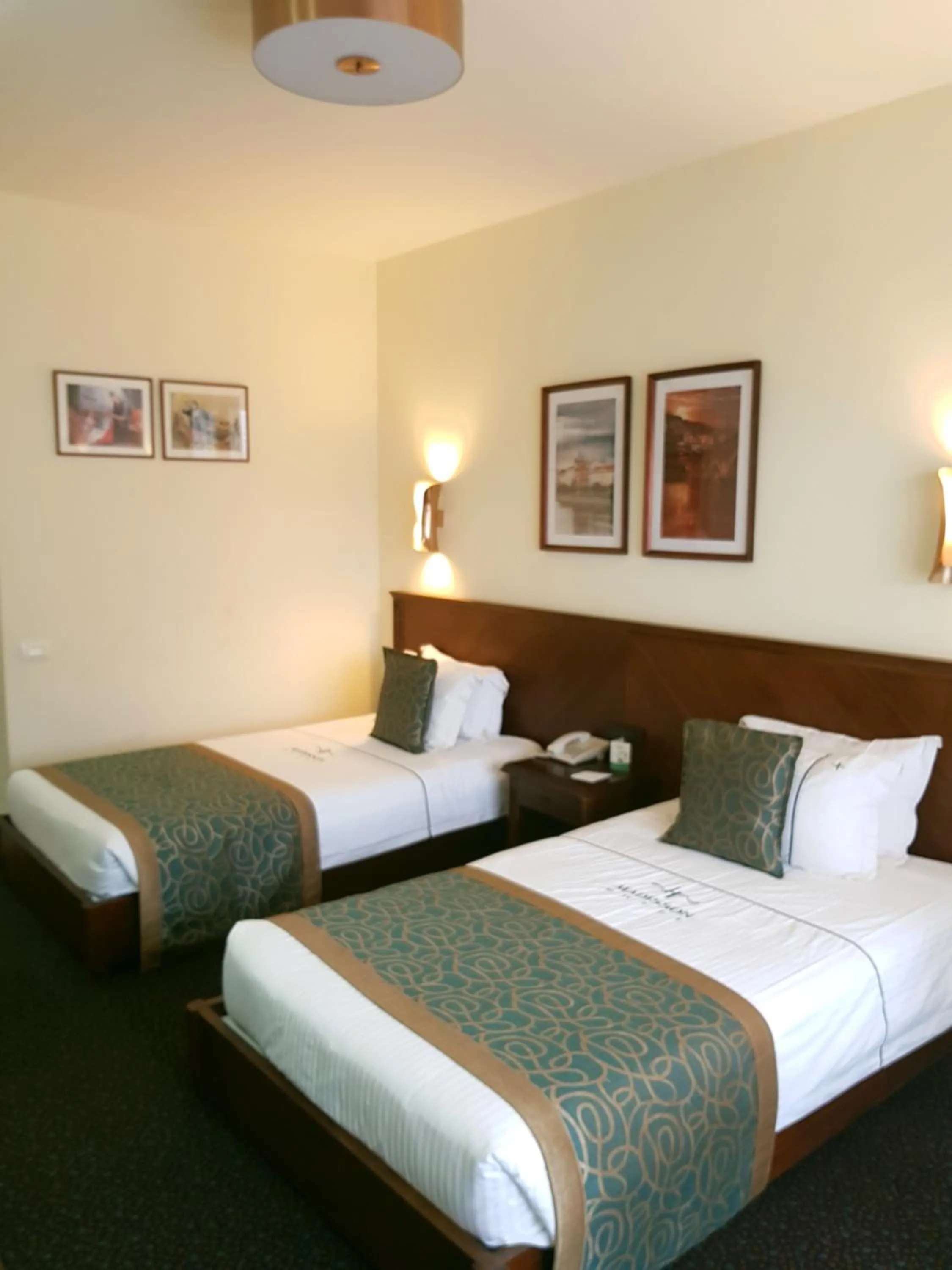 Bed in Madisson Hotel