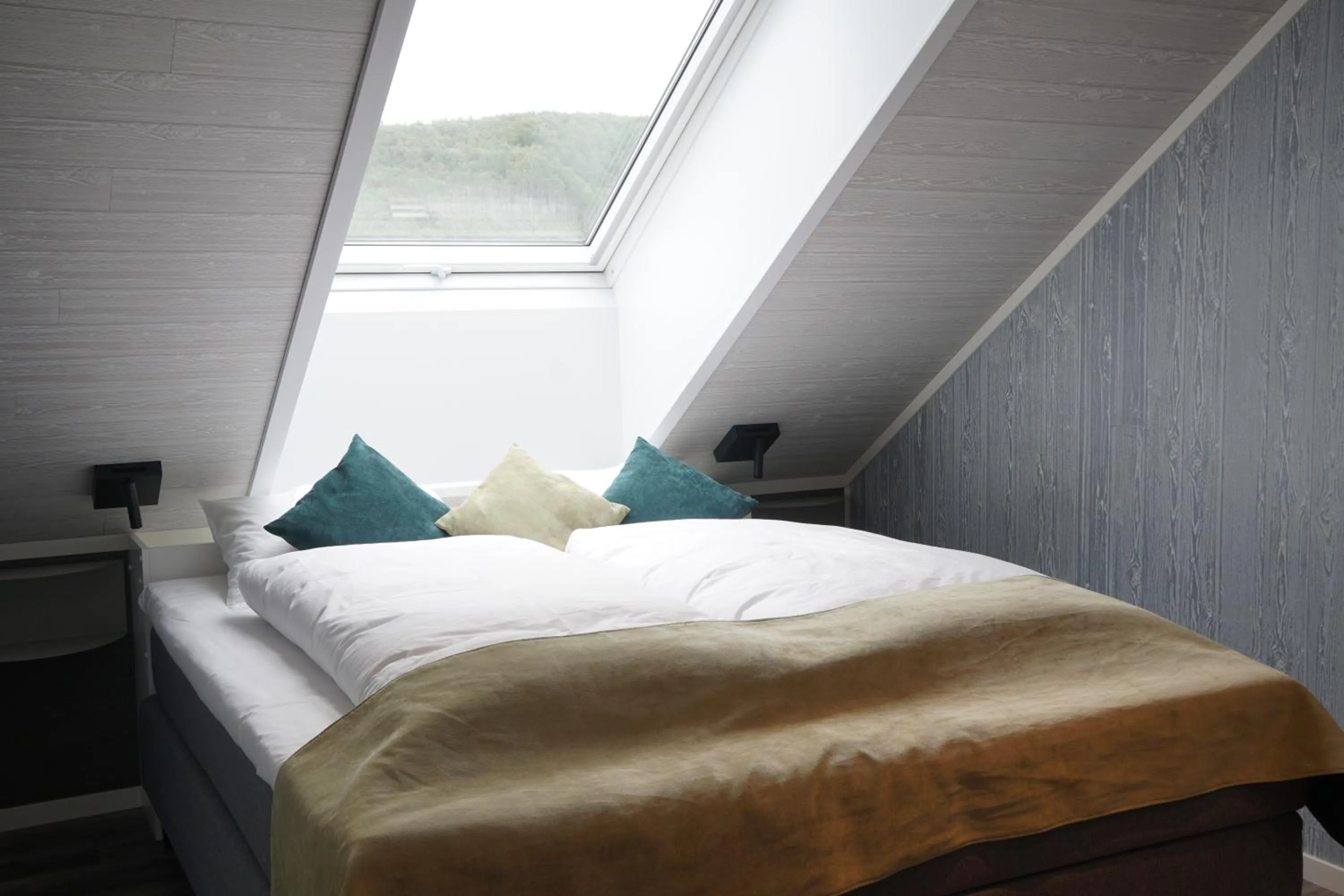 Bed in Senja Fjordhotell and Apartments