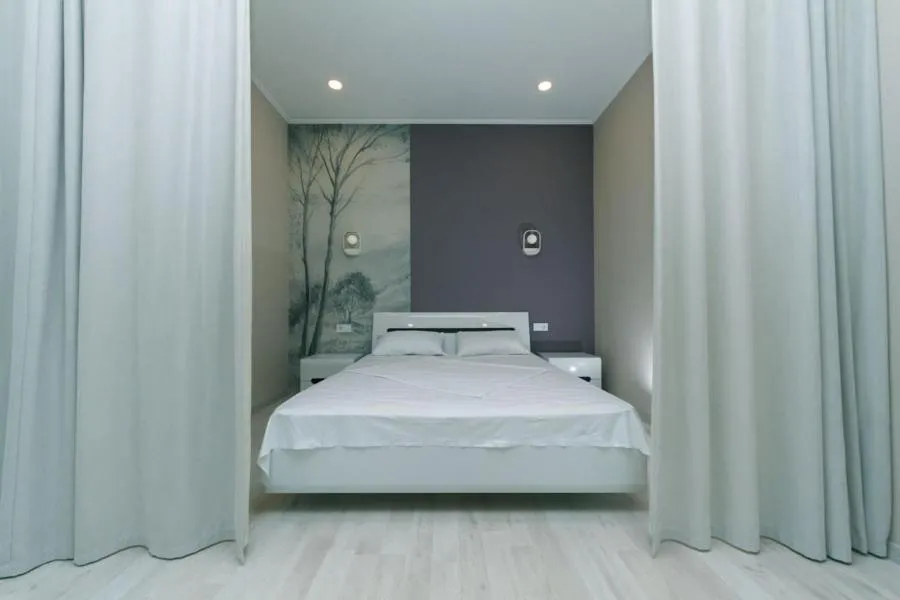 Bed in Apartment in Smart Plaza