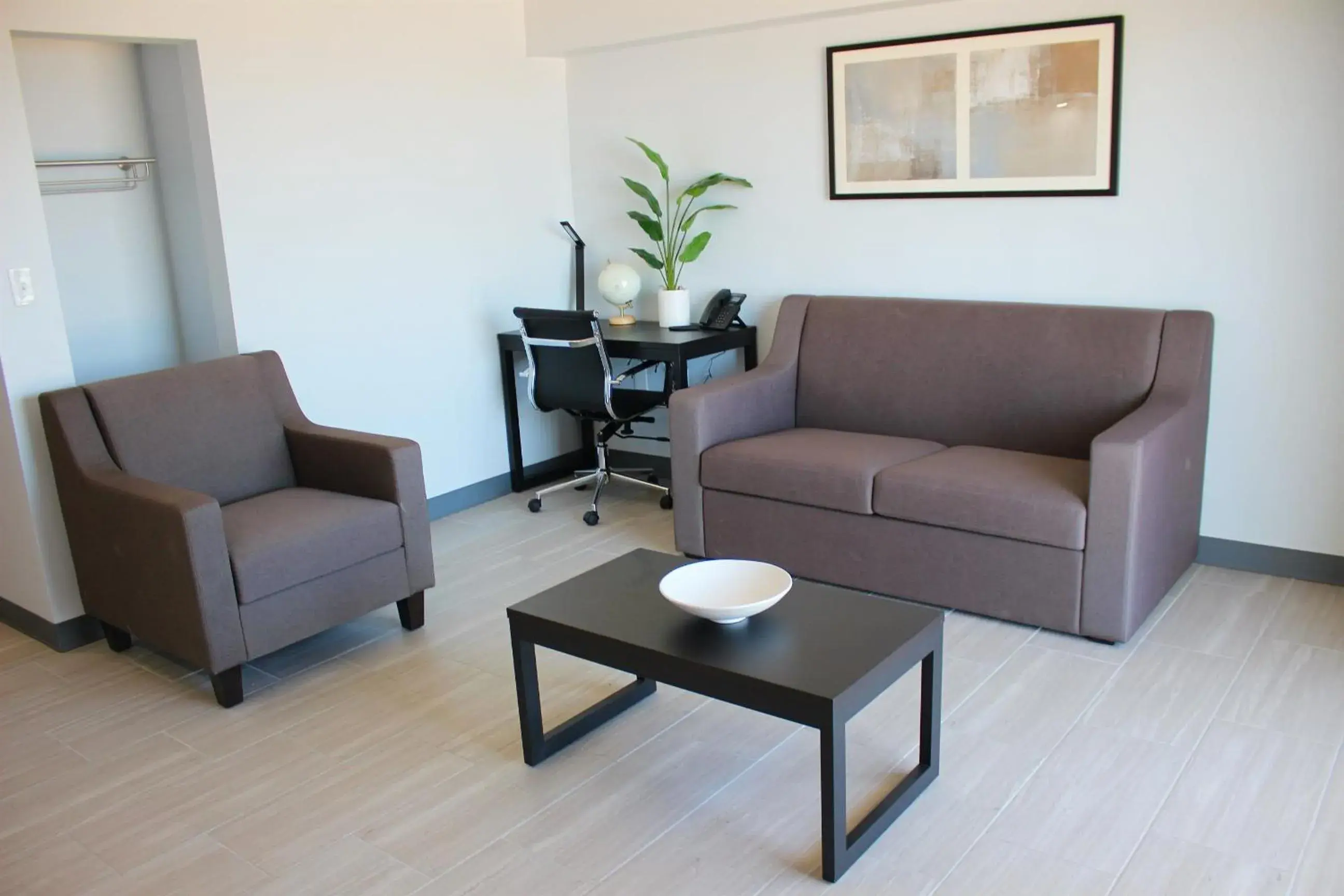 Living room in Sun & Sand Resort Oceanfront Suites Living room in Sun & Sand Resort Oceanfront Suites