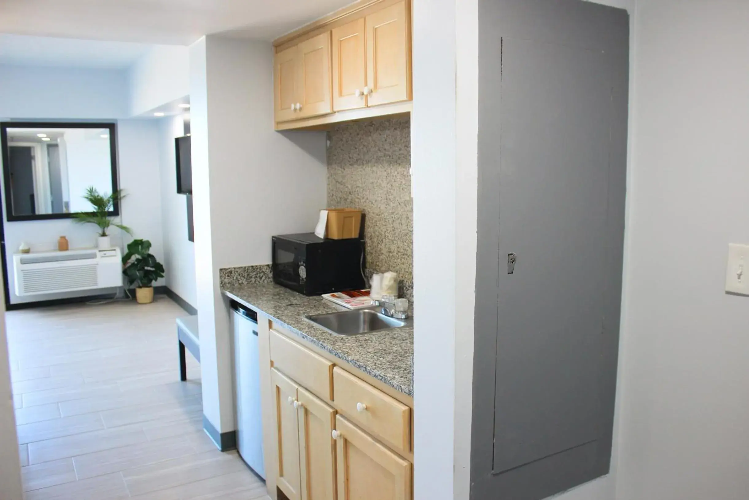 Kitchen or kitchenette in Sun & Sand Resort Oceanfront Suites Kitchen or kitchenette in Sun & Sand Resort Oceanfront Suites