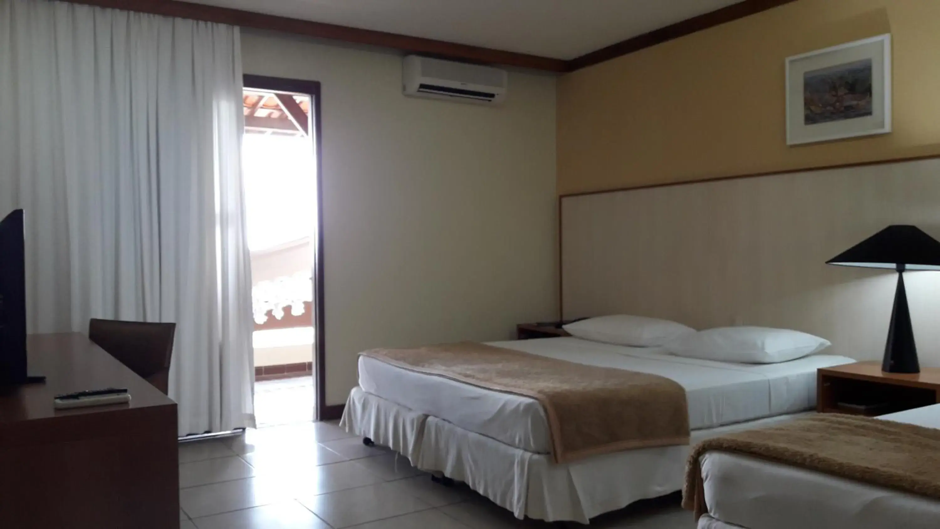 Photo of the whole room, Bed in Garden Hotel Photo of the whole room, Bed in Garden Hotel