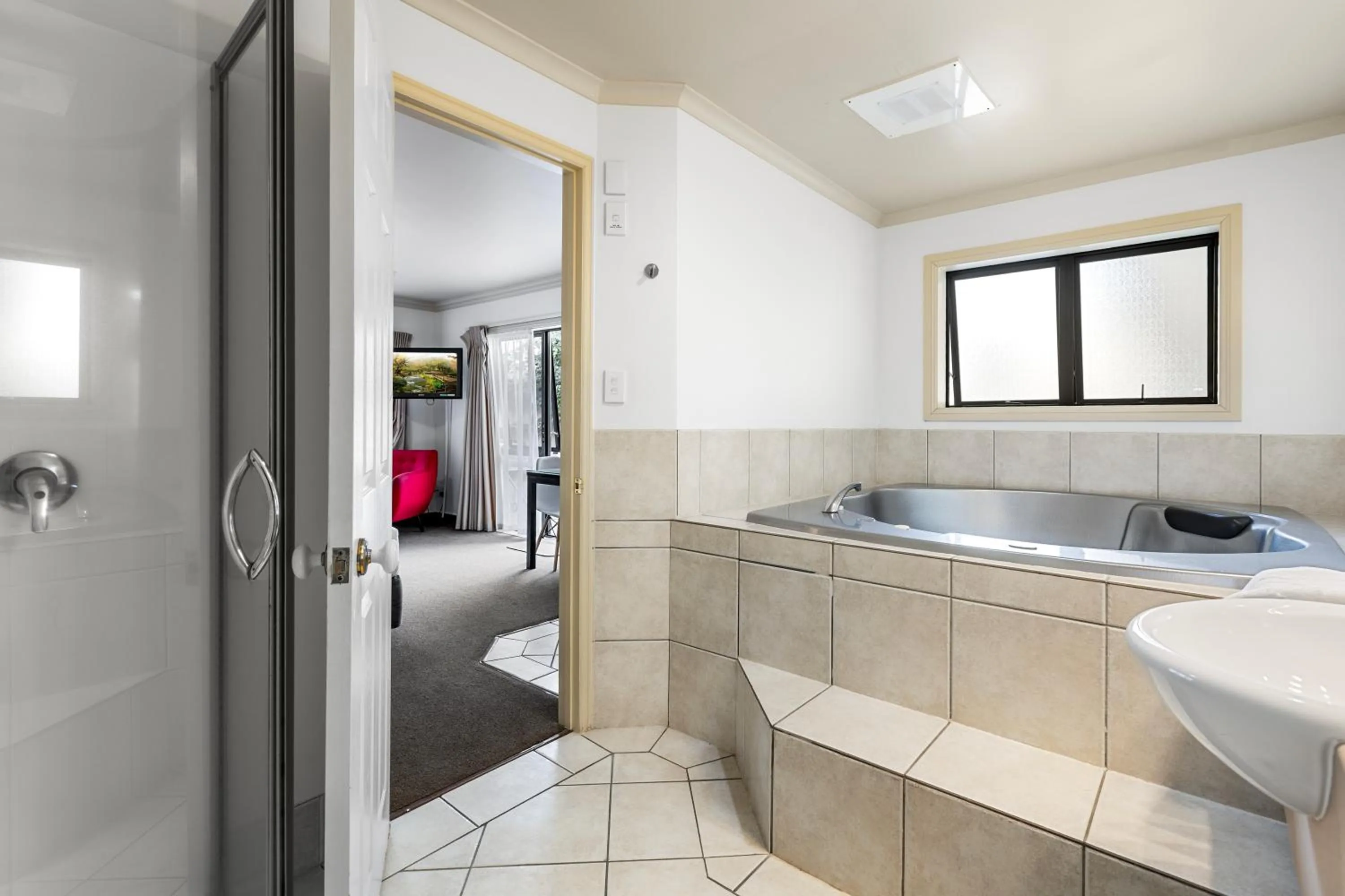 Bed in Tuscany Villas Whakatane