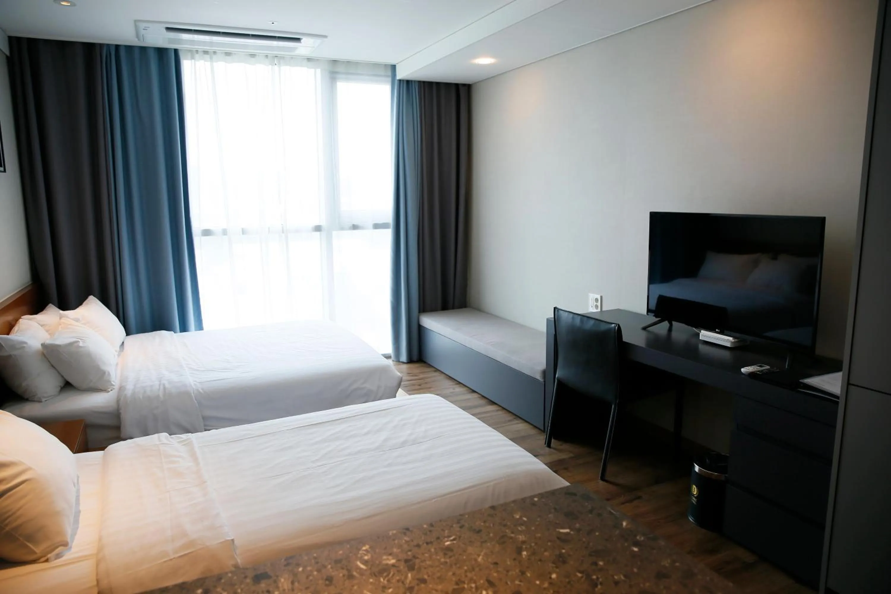 Bed in J One Hotel Cheongju