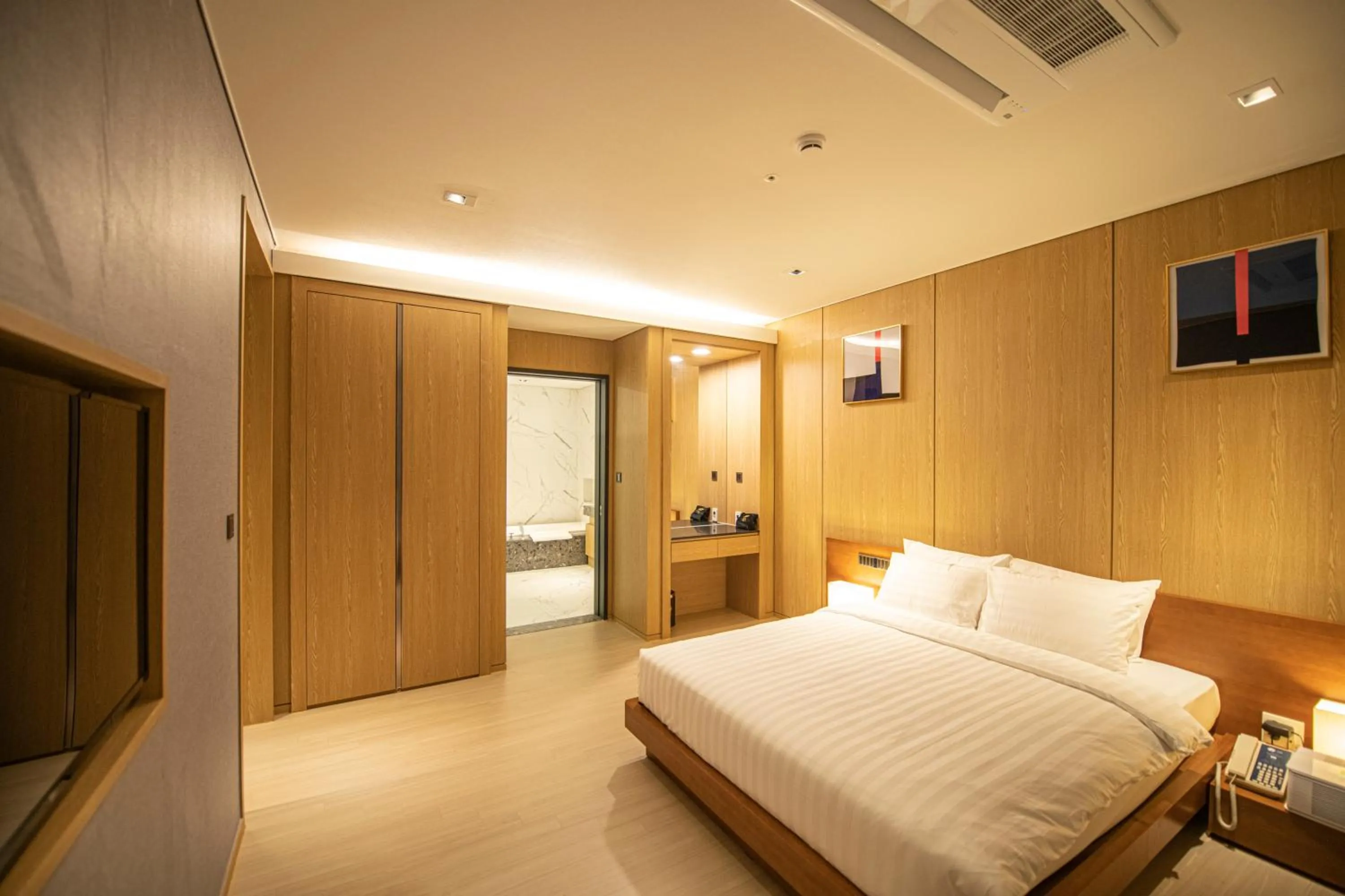 Bed in J One Hotel Cheongju