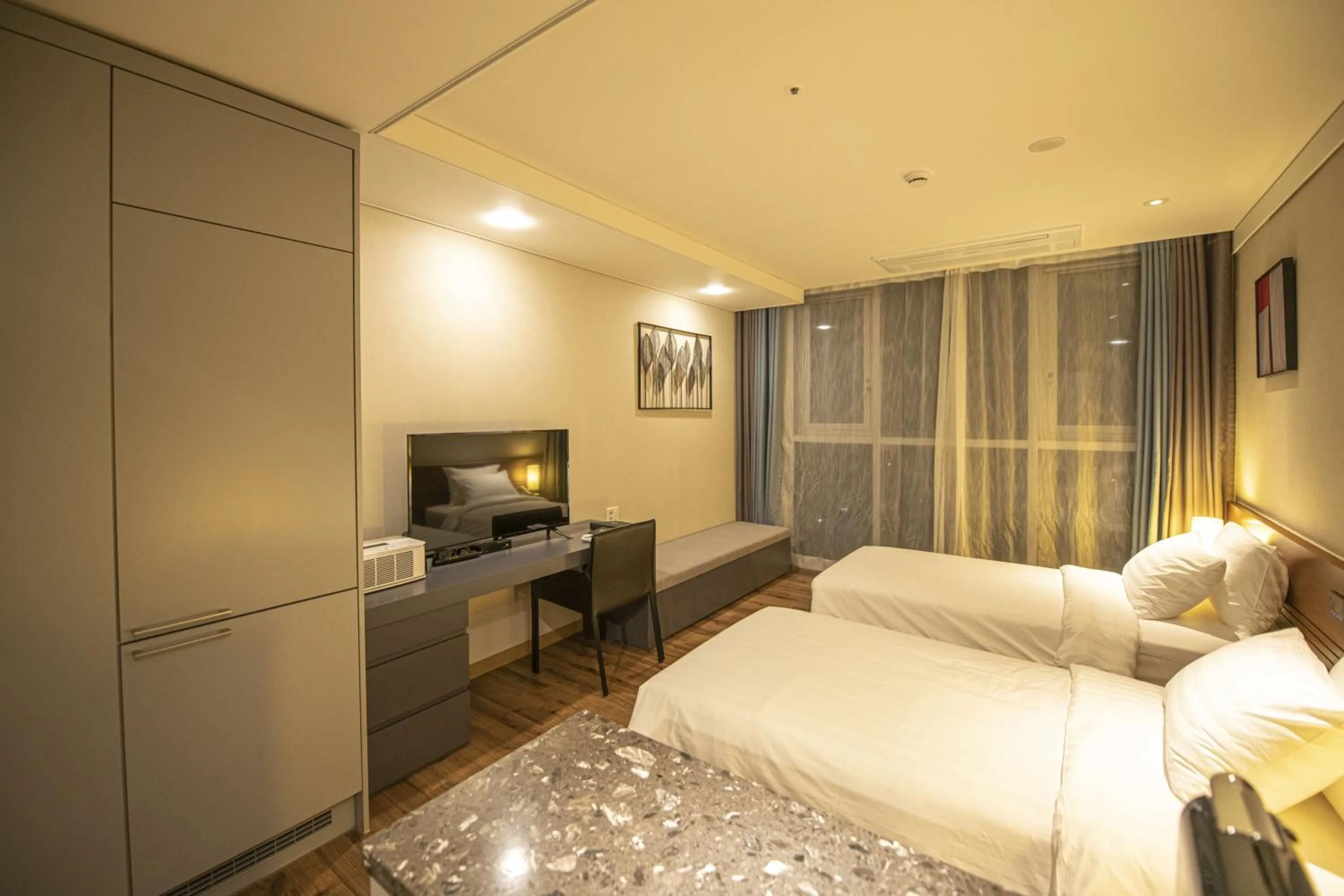 Bed in J One Hotel Cheongju