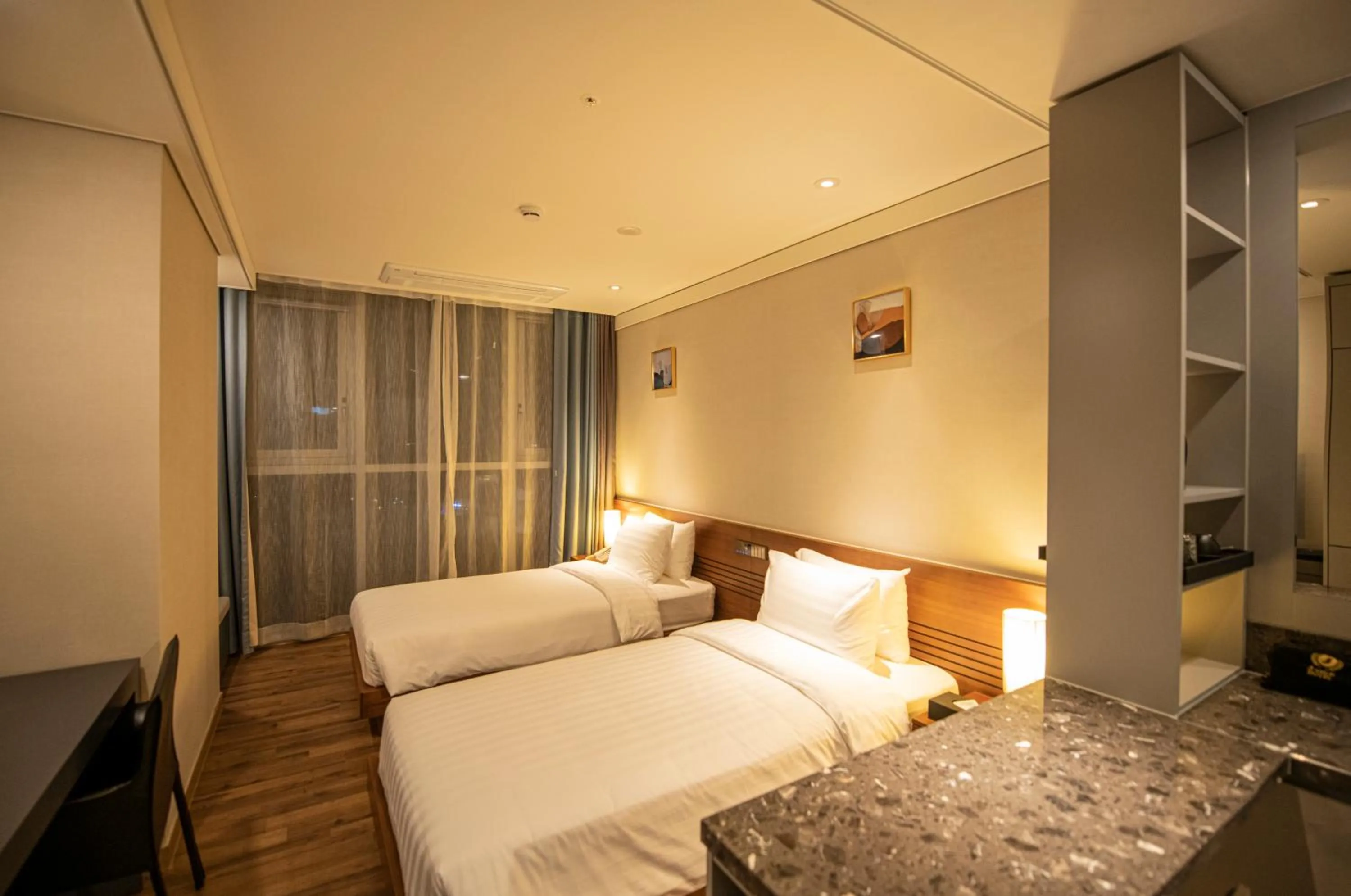 Bed in J One Hotel Cheongju