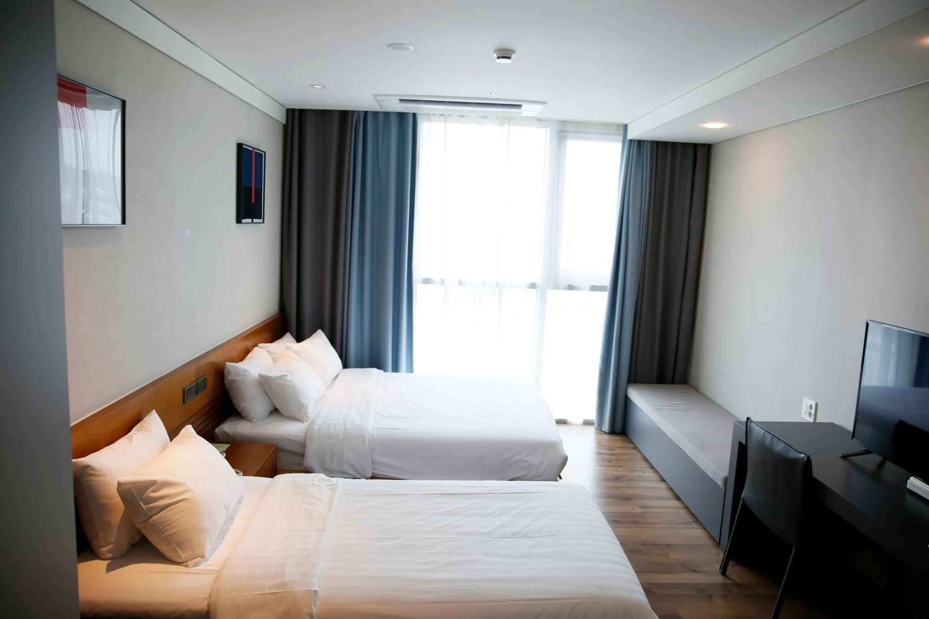 Bed in J One Hotel Cheongju