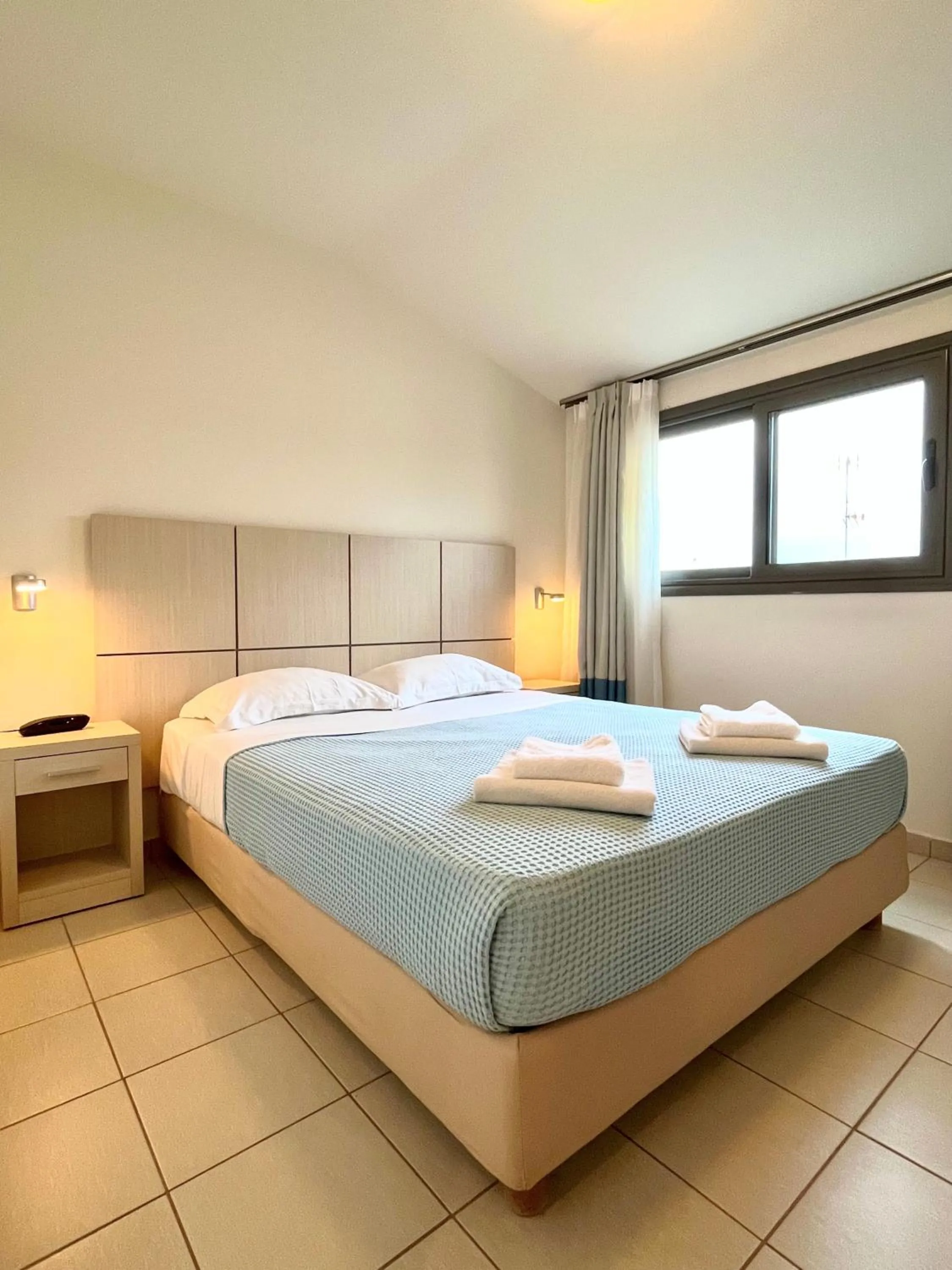 Bed in Hotel Mavridis