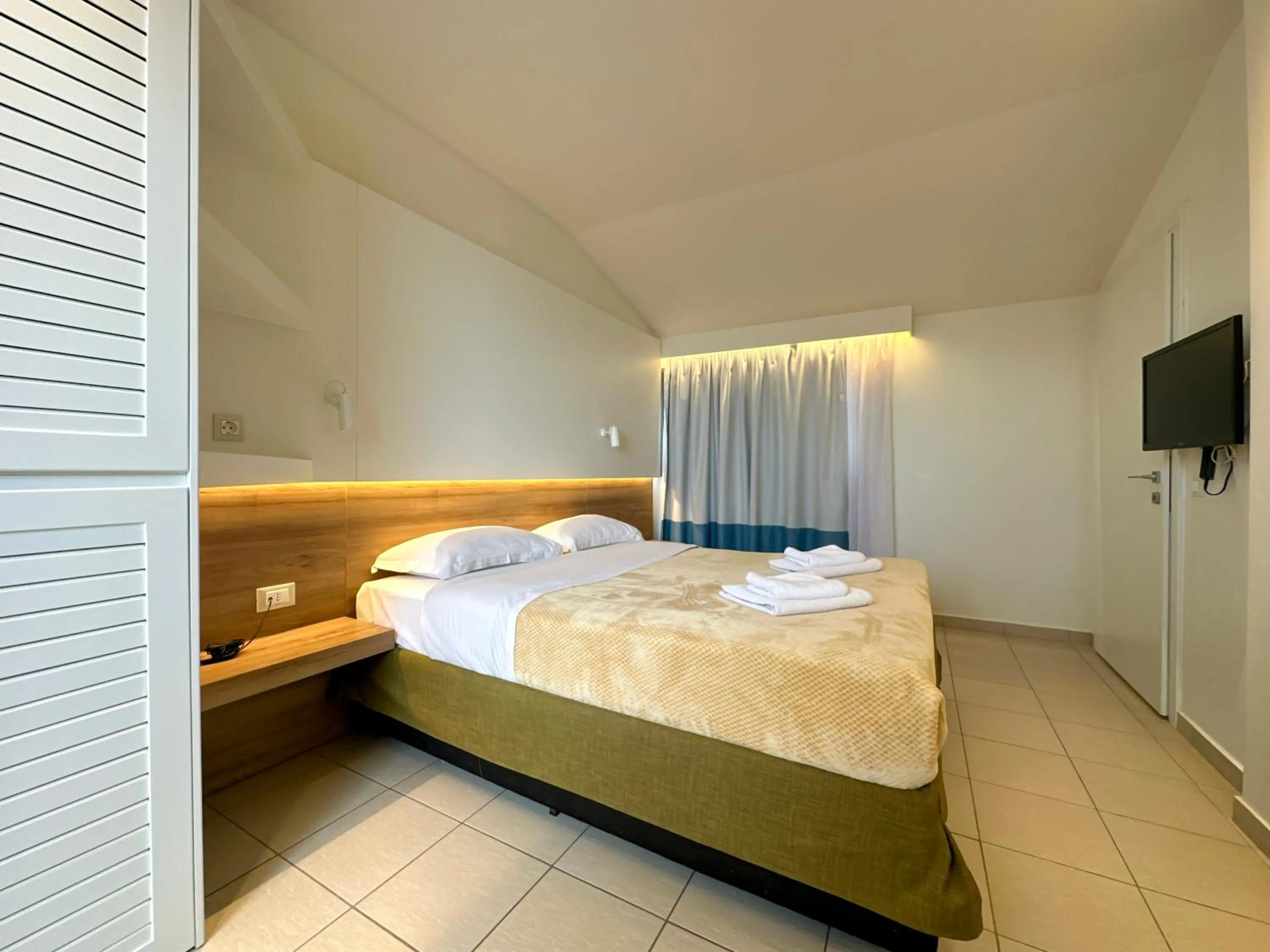 Bed in Hotel Mavridis