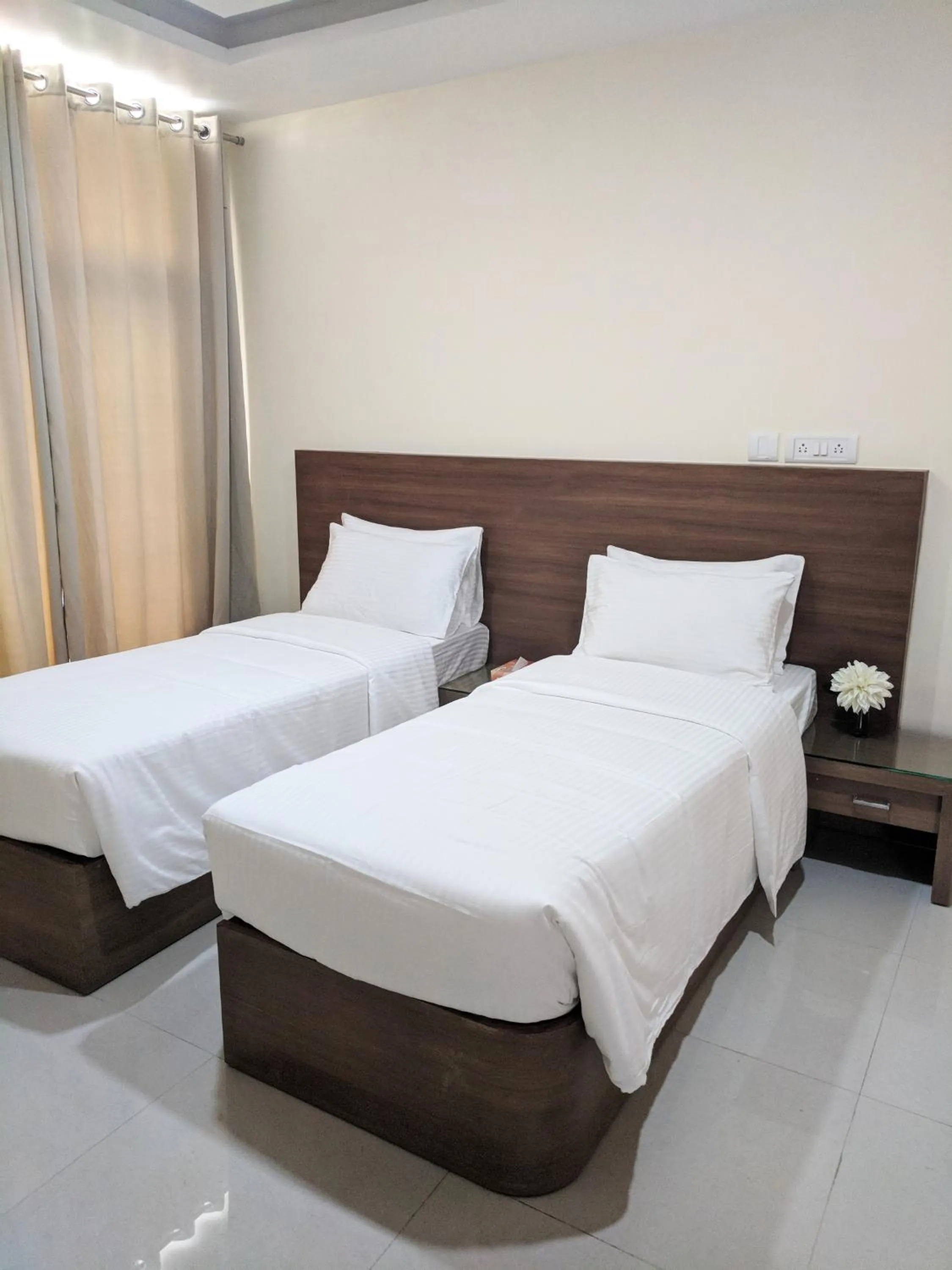 Bed in Clyford Suites